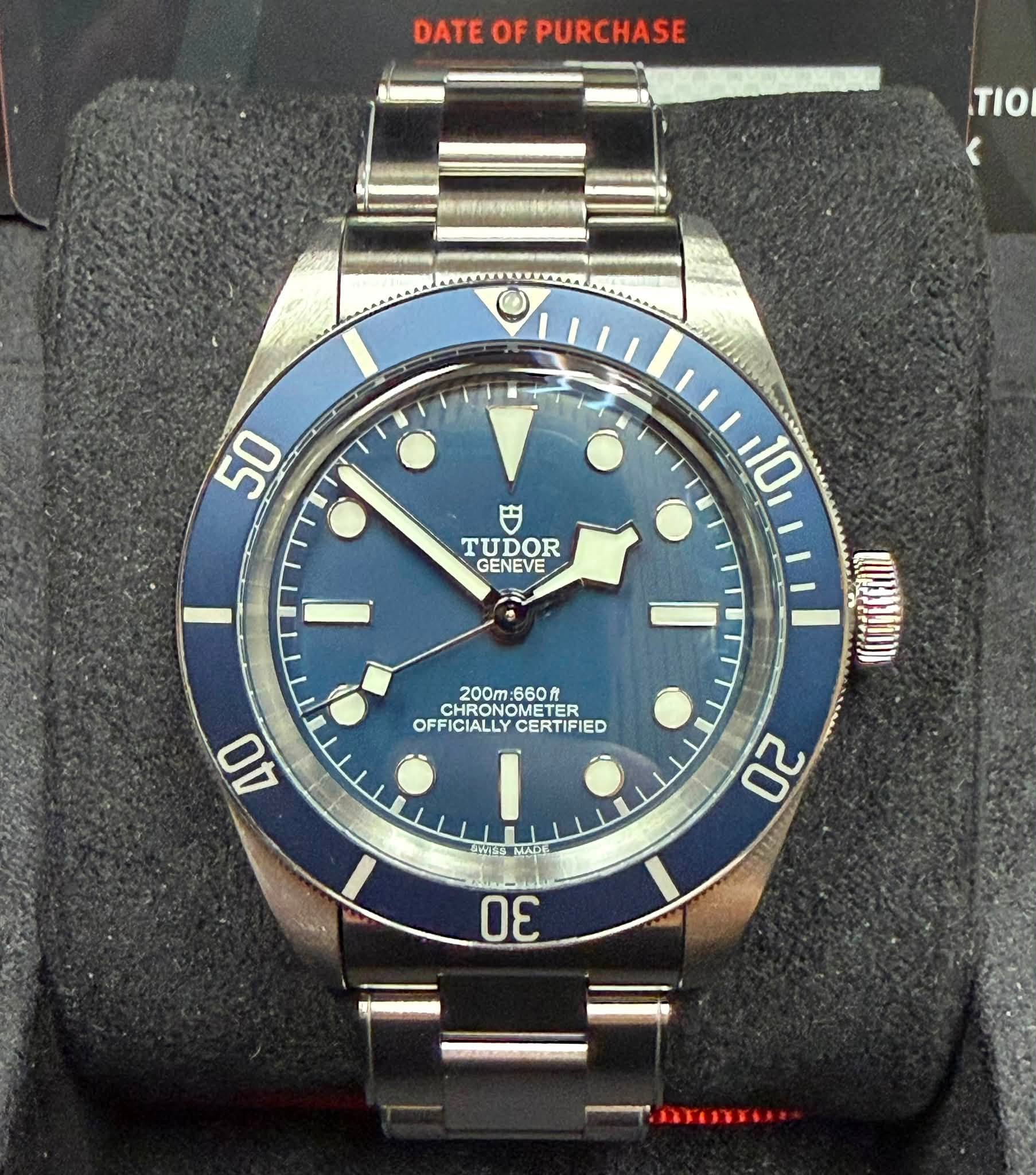 May be an image of wrist watch and text that says 'DATE OF PURCHASE TIO TIO 50 TUDOR GENEVE 10 200m 660Л CHRONG CHRONO CHRO METER ER OFFICIALLY OFFICIALLYCERTIFIED CERTIFIED 40…