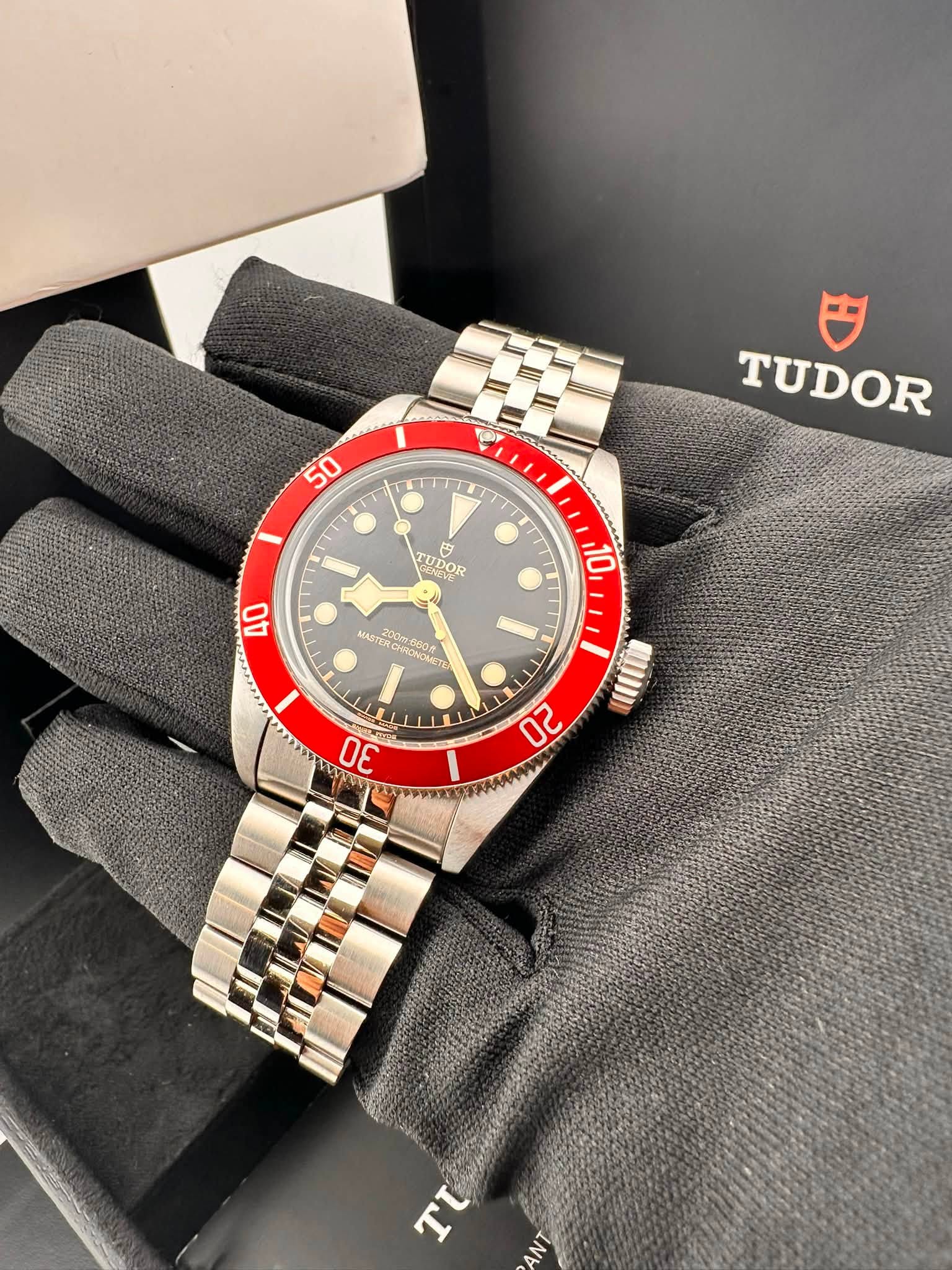 May be an image of wrist watch and text
