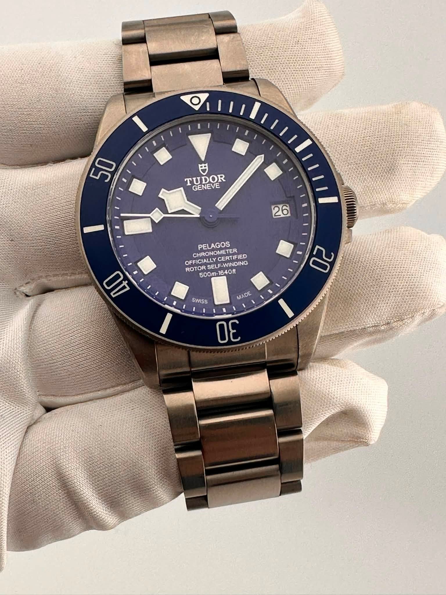 May be an image of wrist watch and text that says '50 TUDOR GENEVE 26 PELAGOS RONOMETER CERTIFIED CURTE E-WINDIJG WIND OK OFFICIALLY ਕਮर CHRONOM ROTO 500m-1840 640ft 40 500ሙ 4O…