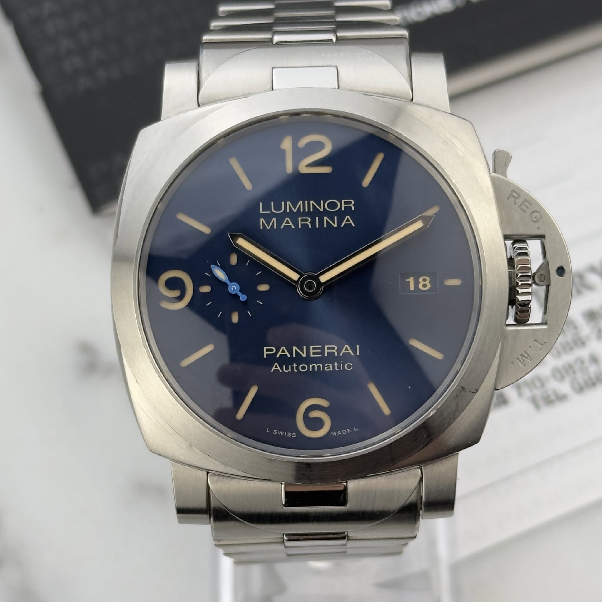 May be an image of wrist watch and text