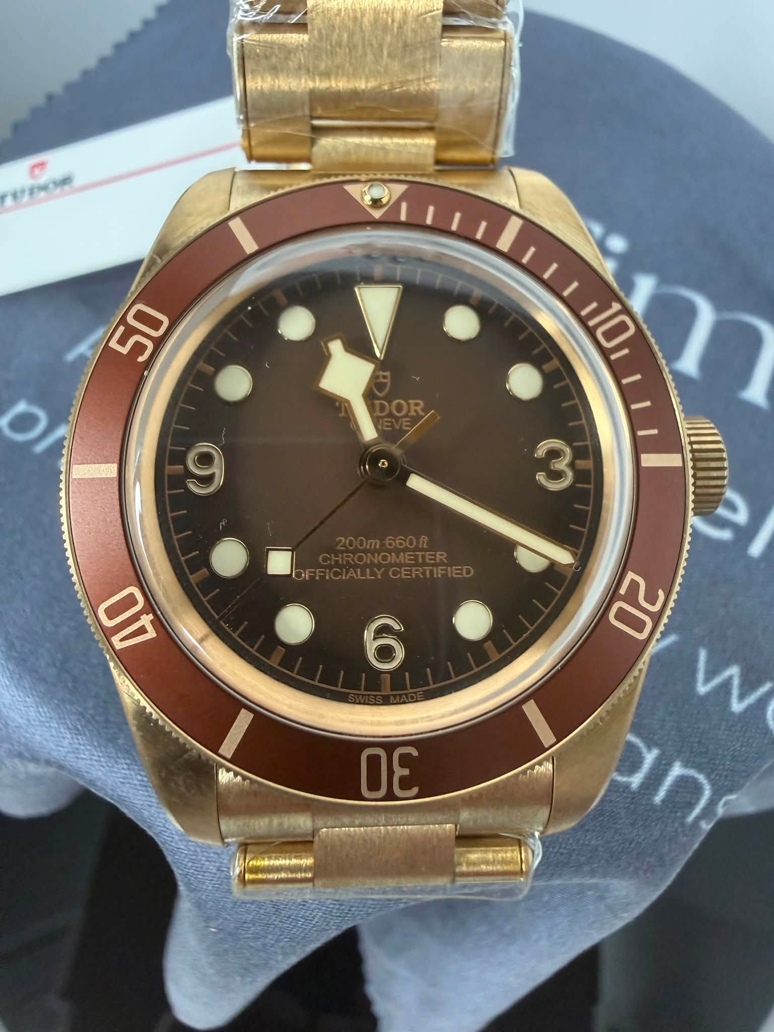May be an image of wrist watch and text