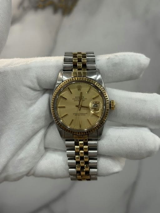 May be an image of wrist watch