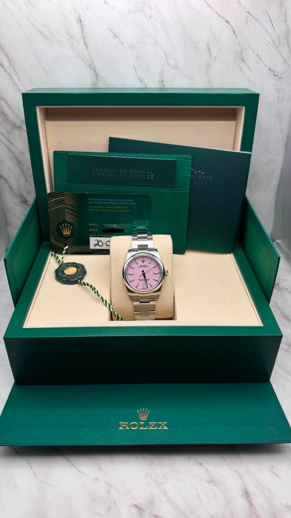 May be an image of wrist watch and text that says '20C ea ۱ ROLEX'