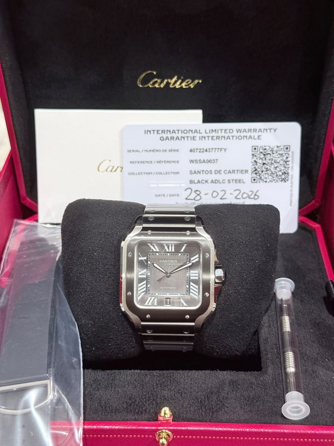 May be an image of wrist watch and text that says 'Cartier SERIAL MUMERO INTERNATIONAL LIMITED WARRANTY GARANTIE INTERNATIONALE SERIE 4072243777FY Can REPEREMICE…