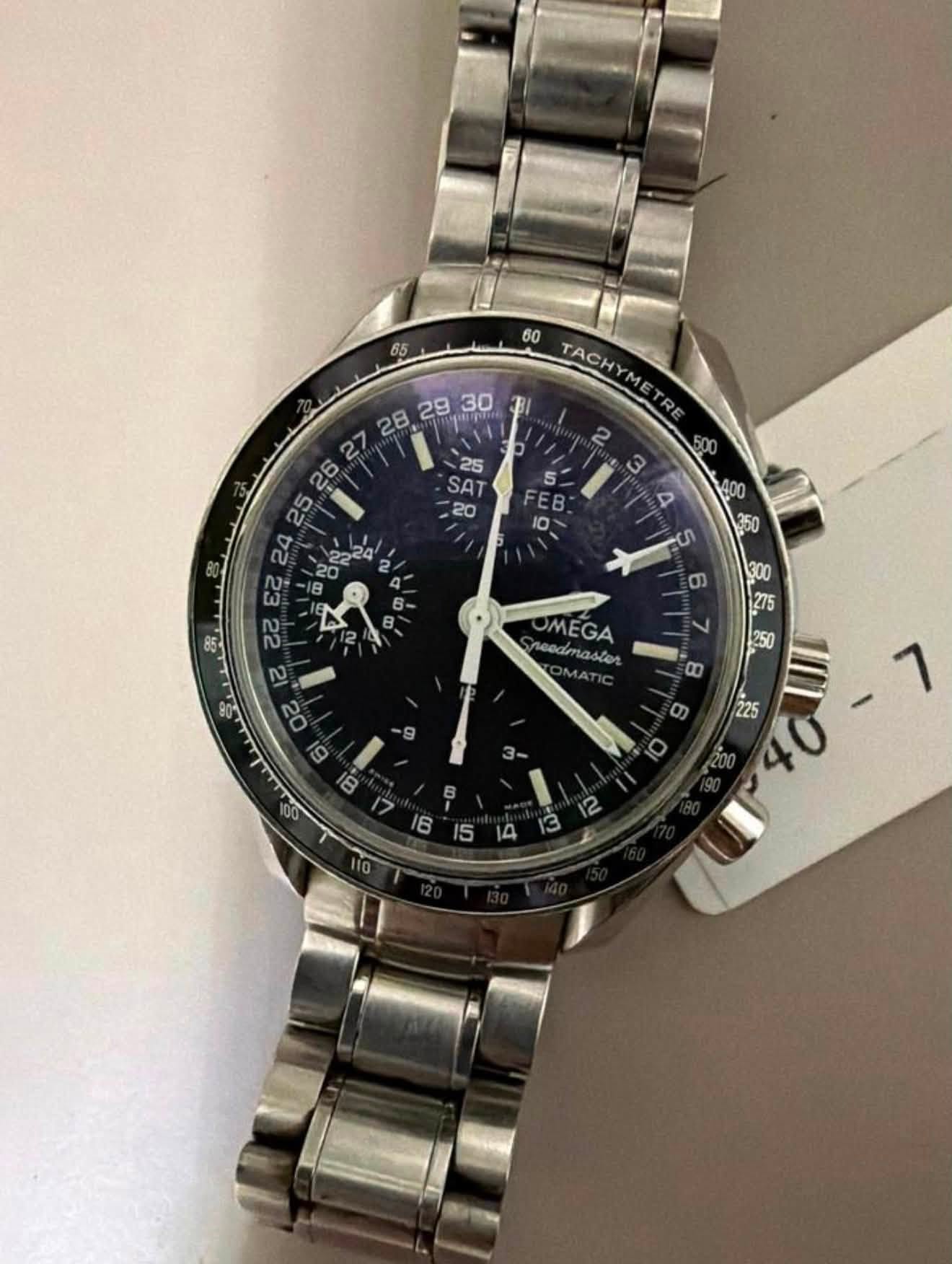 May be an image of wrist watch and text that says '65 60 TACH ME RE SAT Tpe EB យ B ઢट B ወ 300 275 OMEGA eoaTa6o 250 8 9 ത 3- 225 O '
