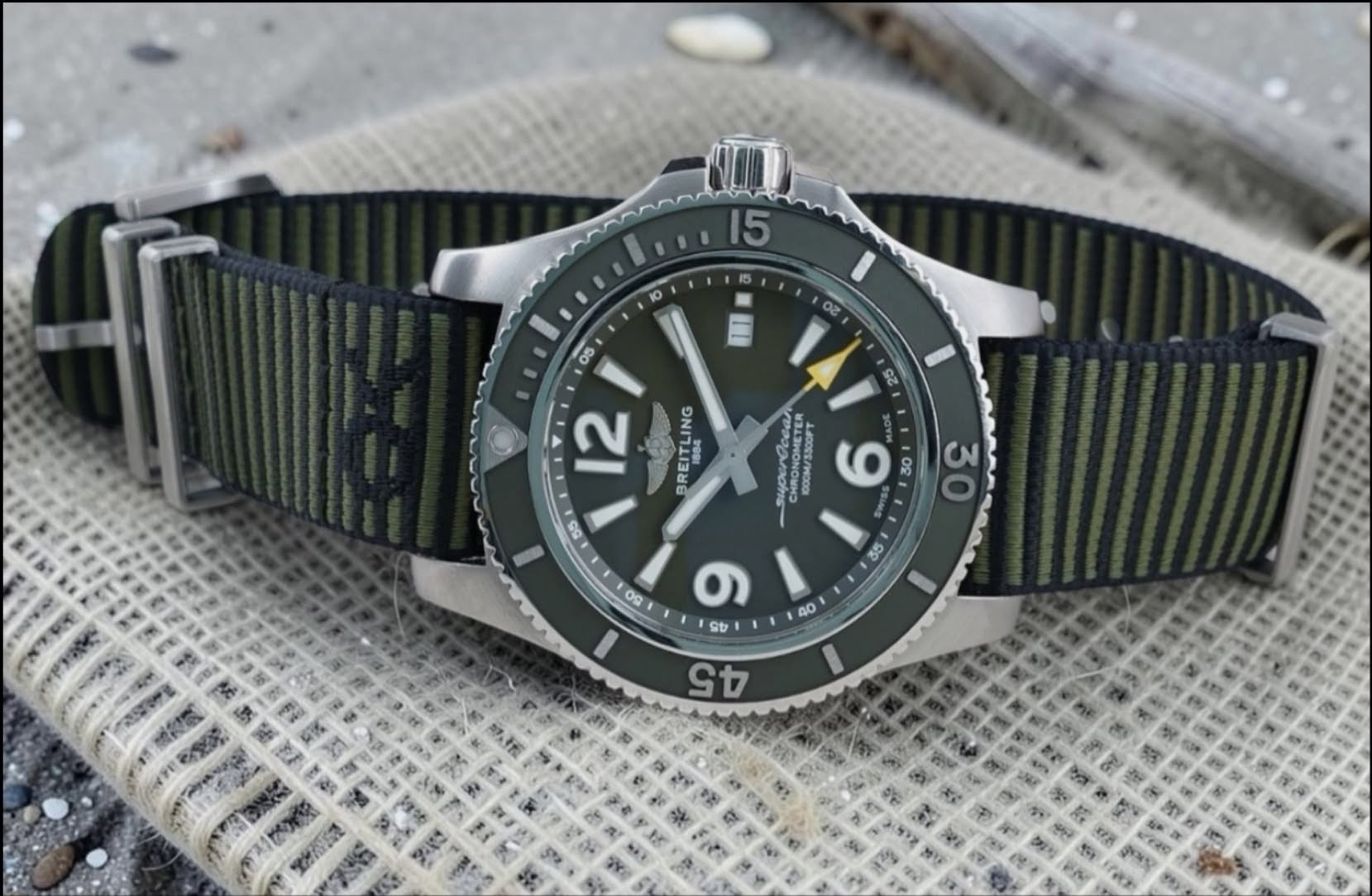 May be an image of wrist watch and text