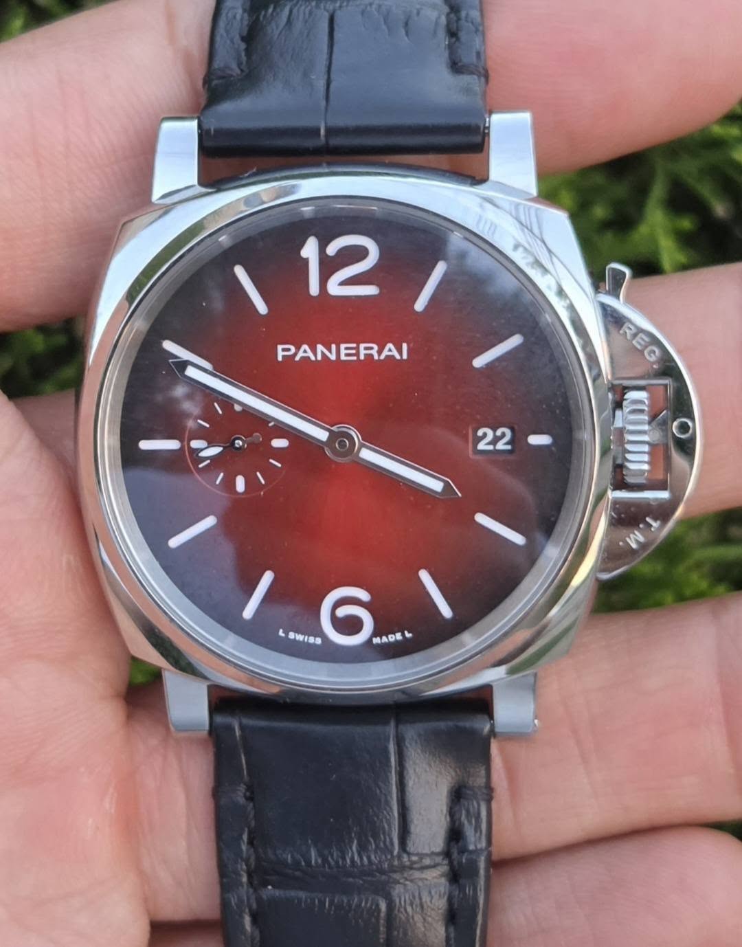 May be an image of wrist watch and text that says '12 PANERAI REG ្ញ W L SWISS SV 6 MADE MAD'