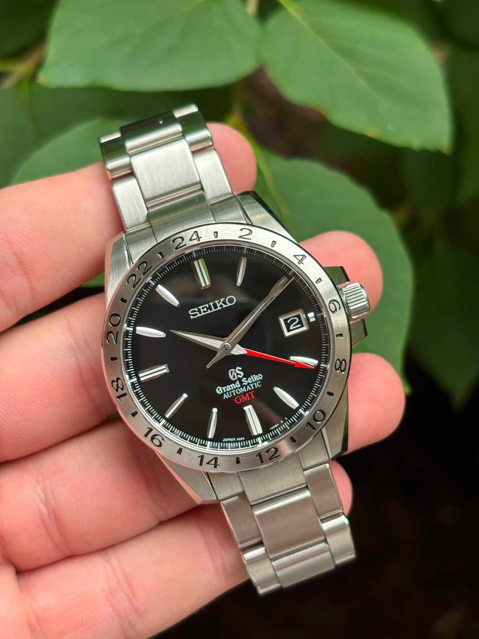 May be an image of wrist watch and text