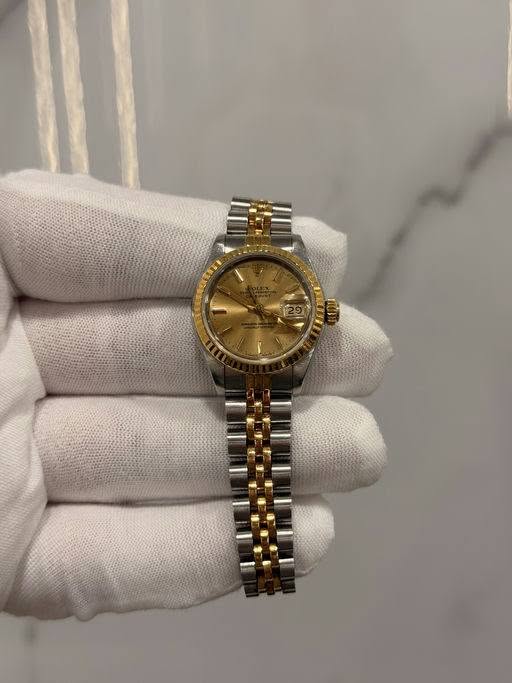 May be an image of wrist watch