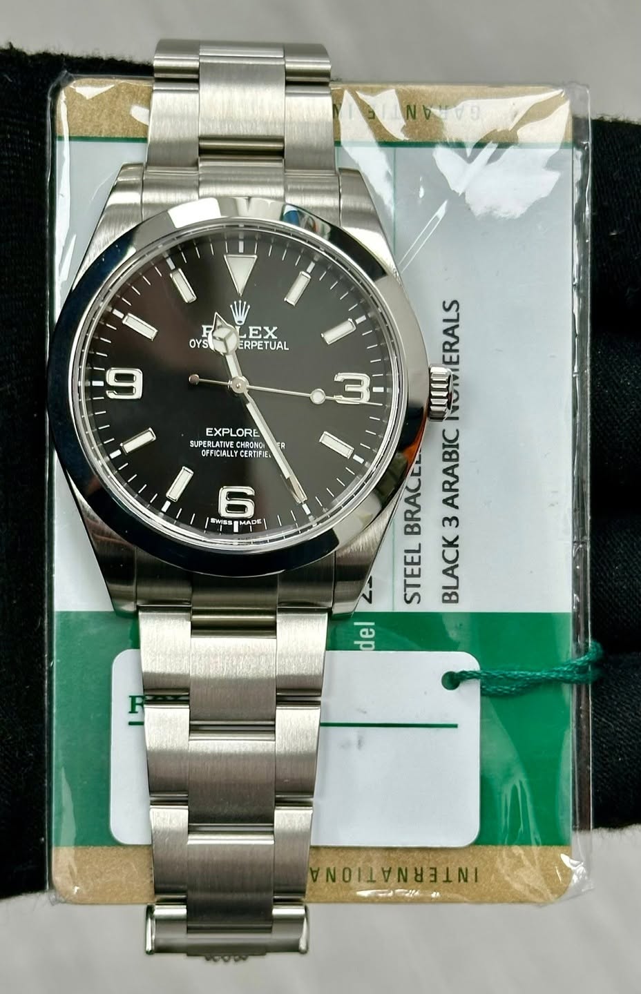 May be an image of digital watch and text that says 'OYS EX ERPETUAL UAL EXPLORE SUPERLATIVECHRO BLATNECH HRONG PERLATIVE OFFICIALLY CERTIFIE ER R SWIS LO MADE ن NUITERALS ERALS…