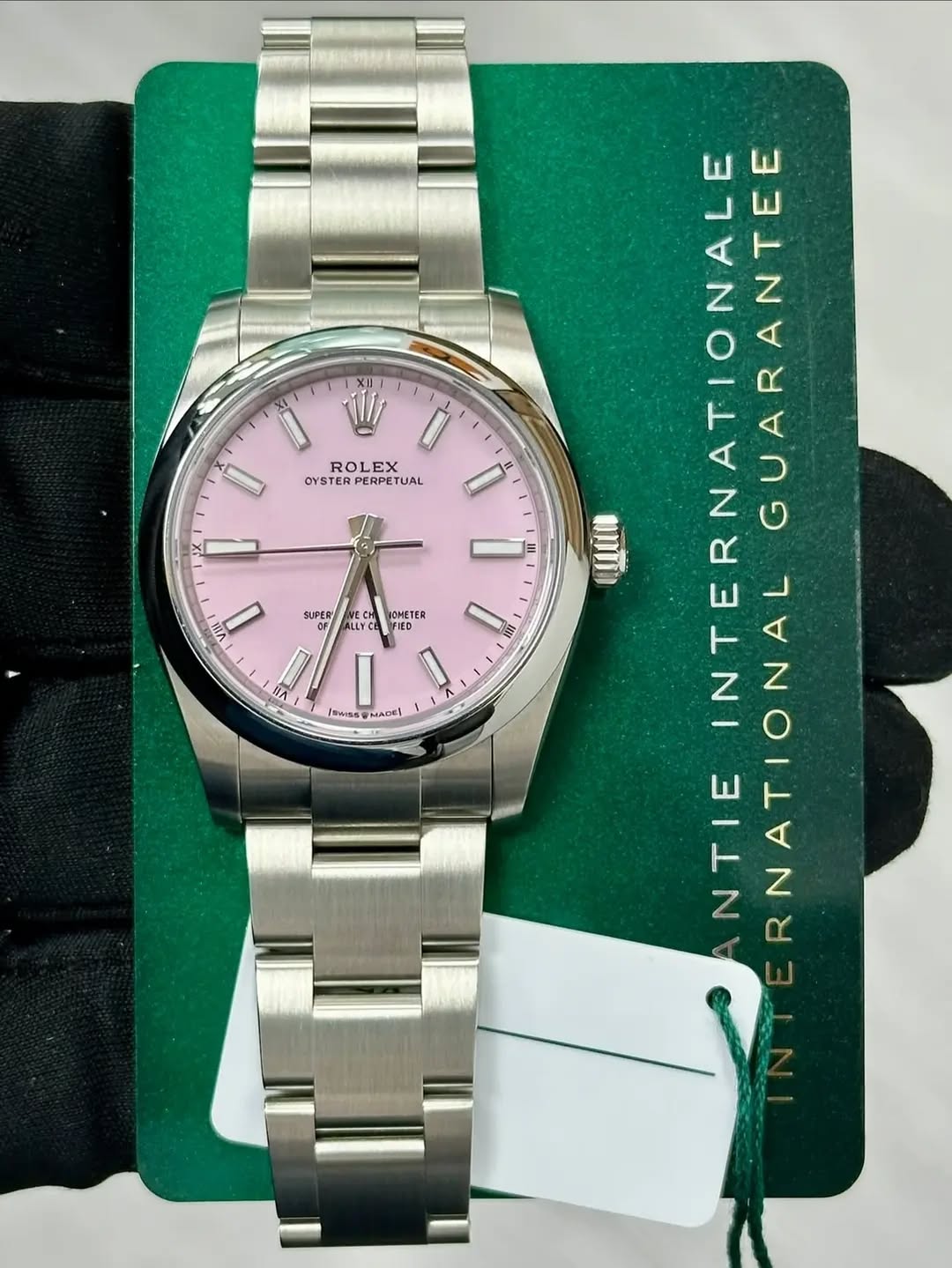 May be an image of wrist watch and text that says 'ROLEX EX OYSTER PERPETUAL III SUPER BNy WECH POMETER LLYCA FIED Iowas I MADE! E NA 7 ATIONALE INTERNATIONALE ANTE GUARANTEE N…