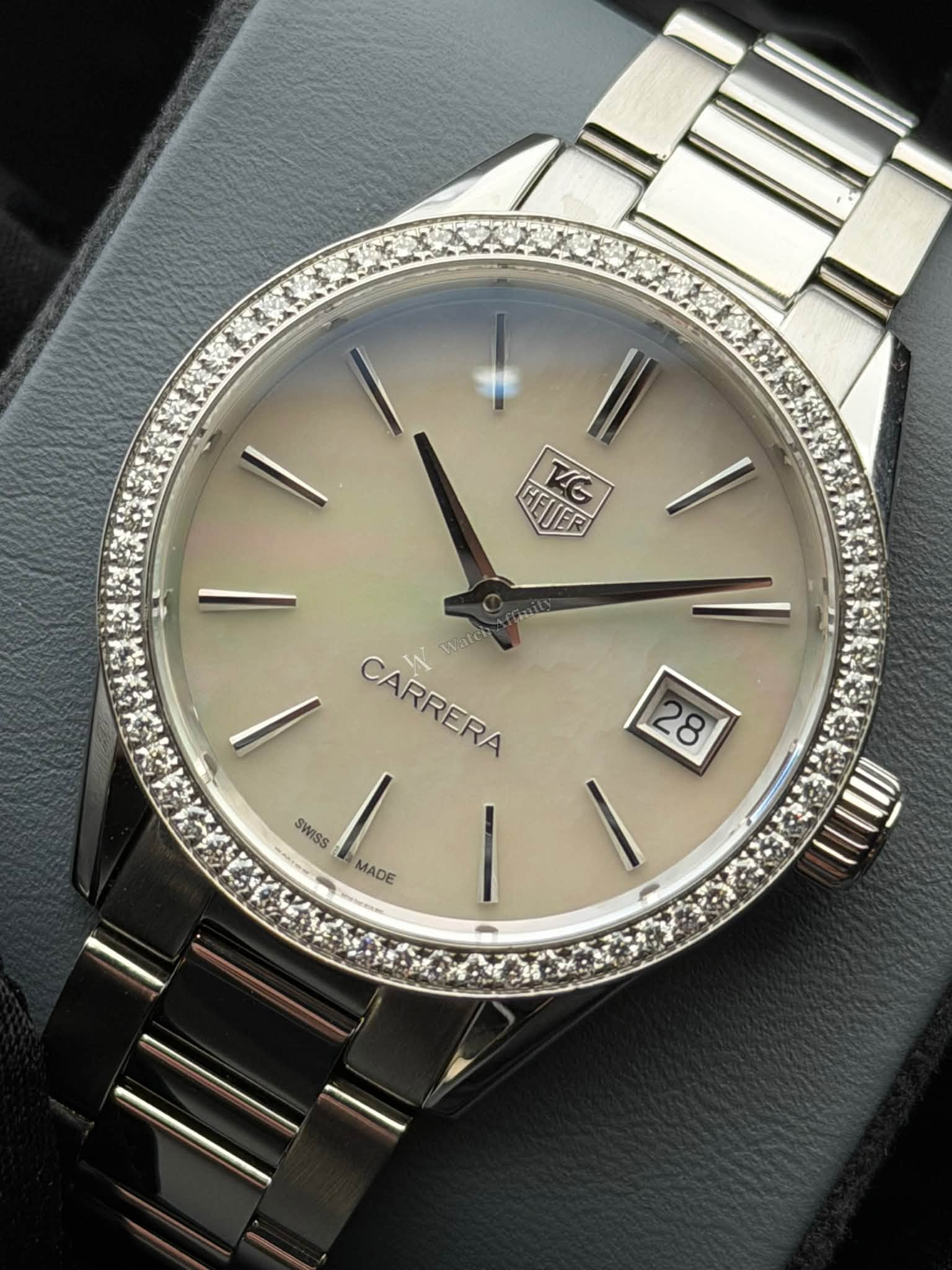 May be an image of wrist watch and text that says 'HFTTER HEIER TG ifattey CARRERA CARRERA 28 SWISS 2 MADE MADE'