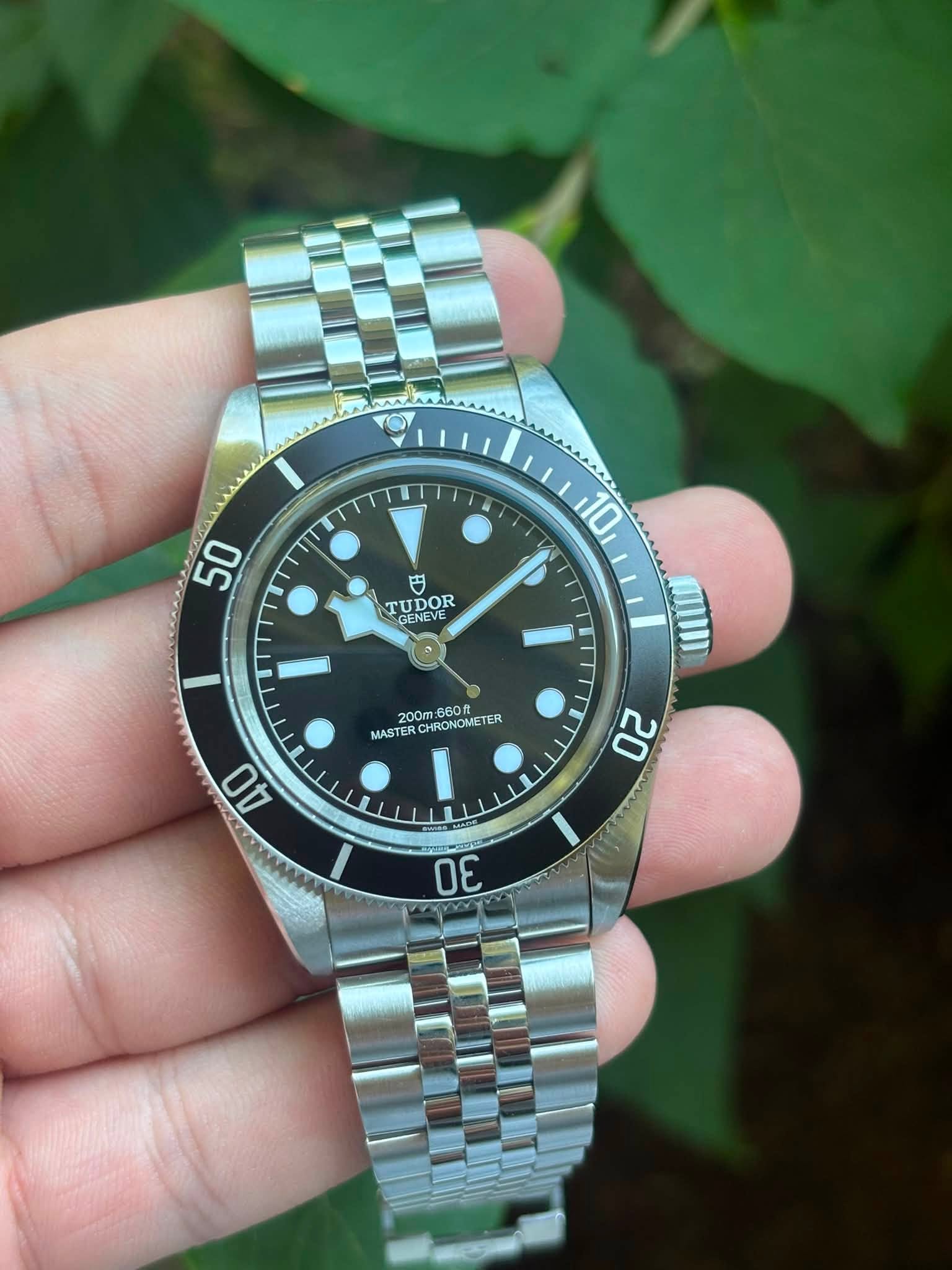 May be an image of wrist watch and text that says '50 10 円 9 TUDOR IDOR GENEVE SENCYE 200m O TER MASTERCHRONOMETER E MASTE MASTERCH HRONOME '