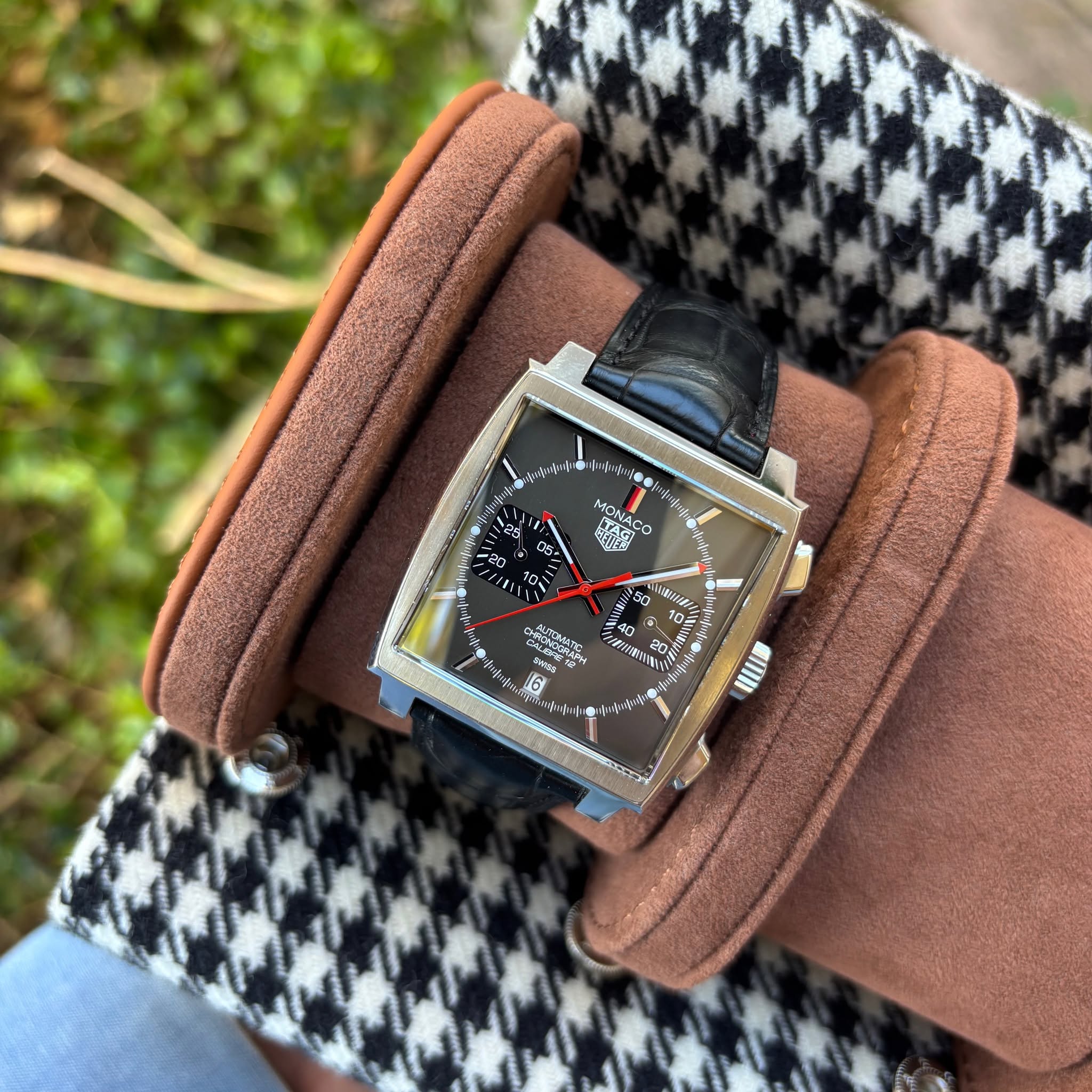 May be an image of wrist watch and text