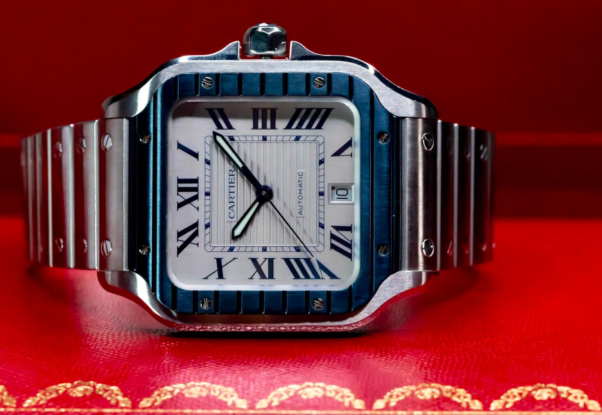 May be an image of wrist watch and text