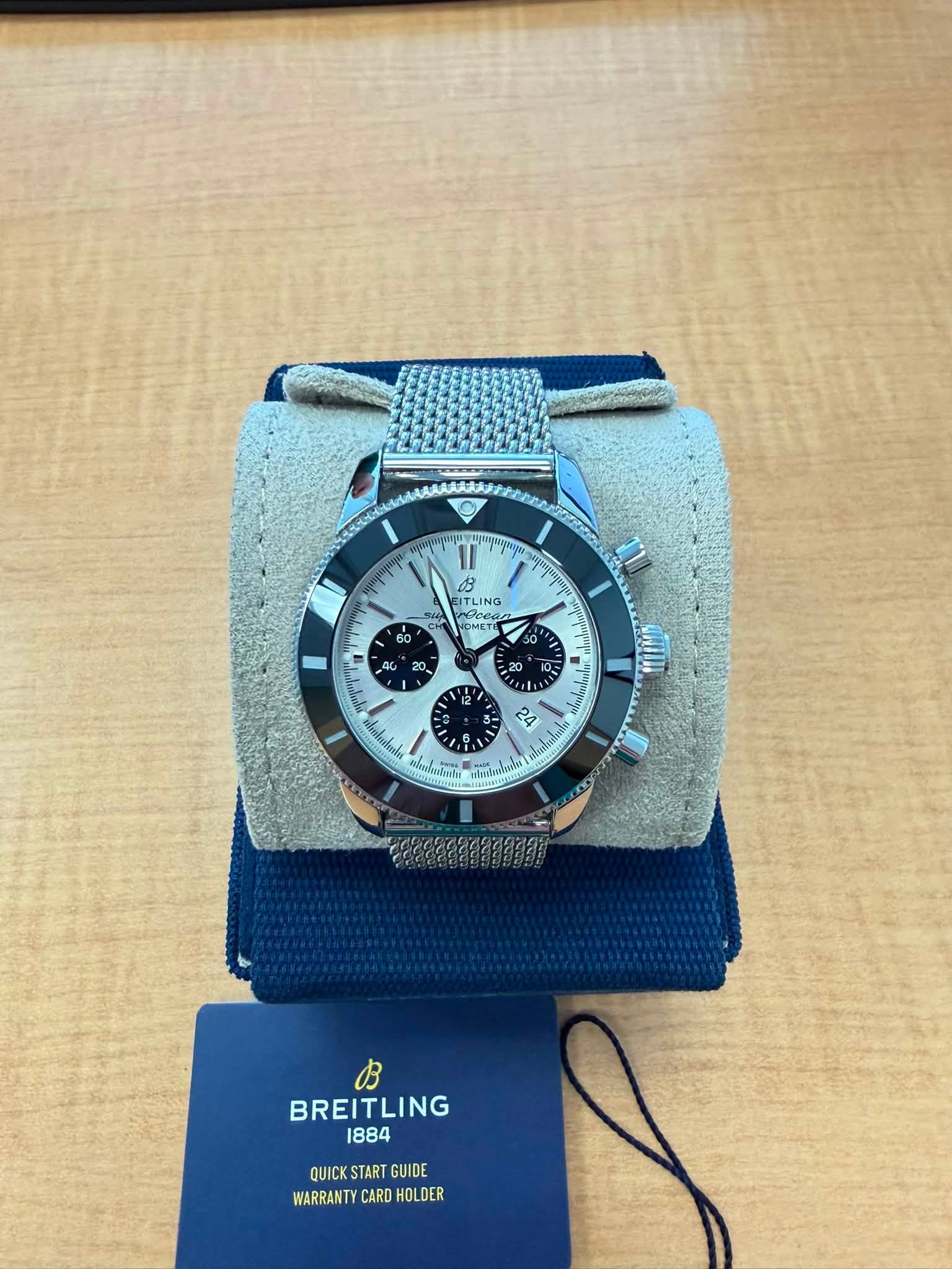 May be an image of wrist watch and text