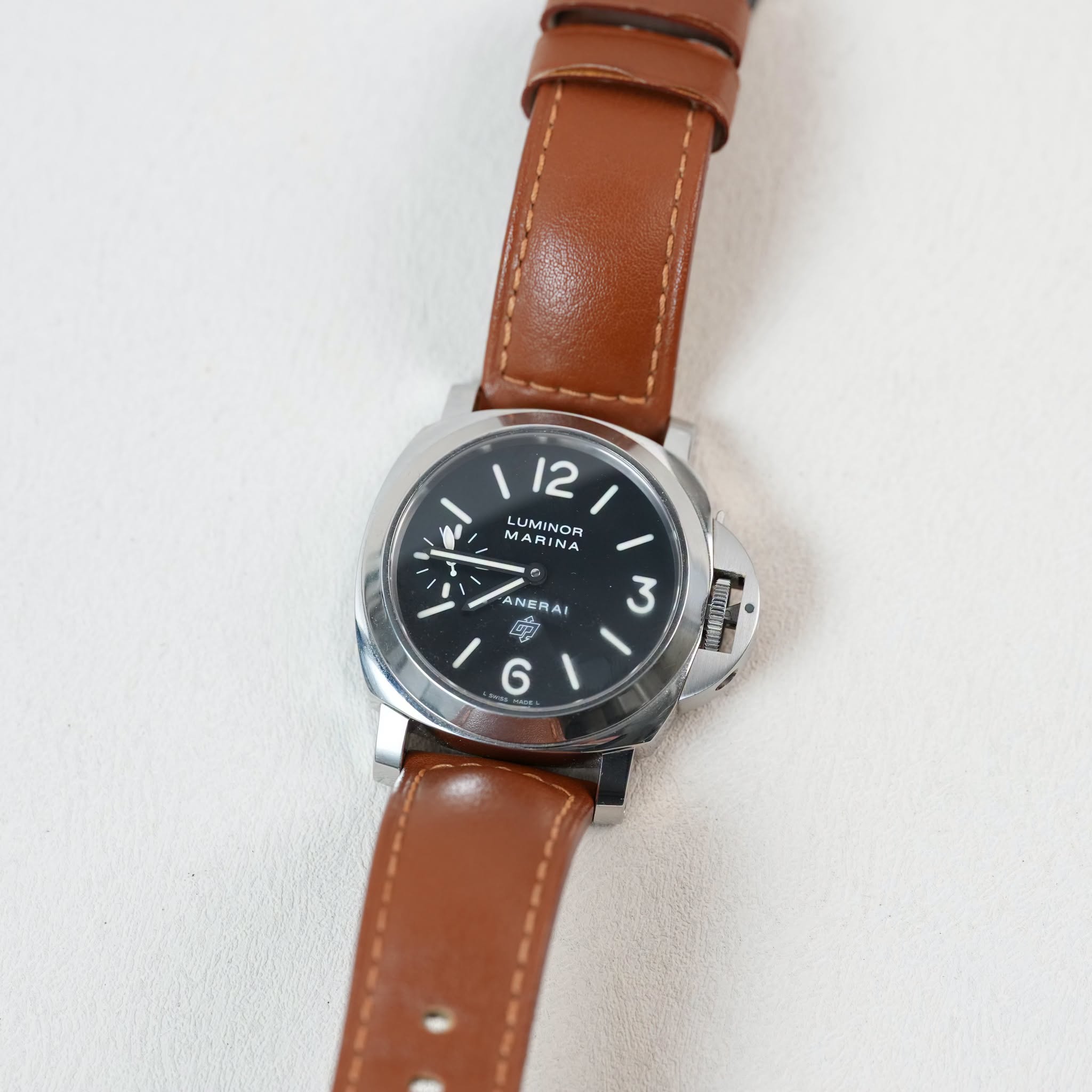 May be an image of leather and wrist watch
