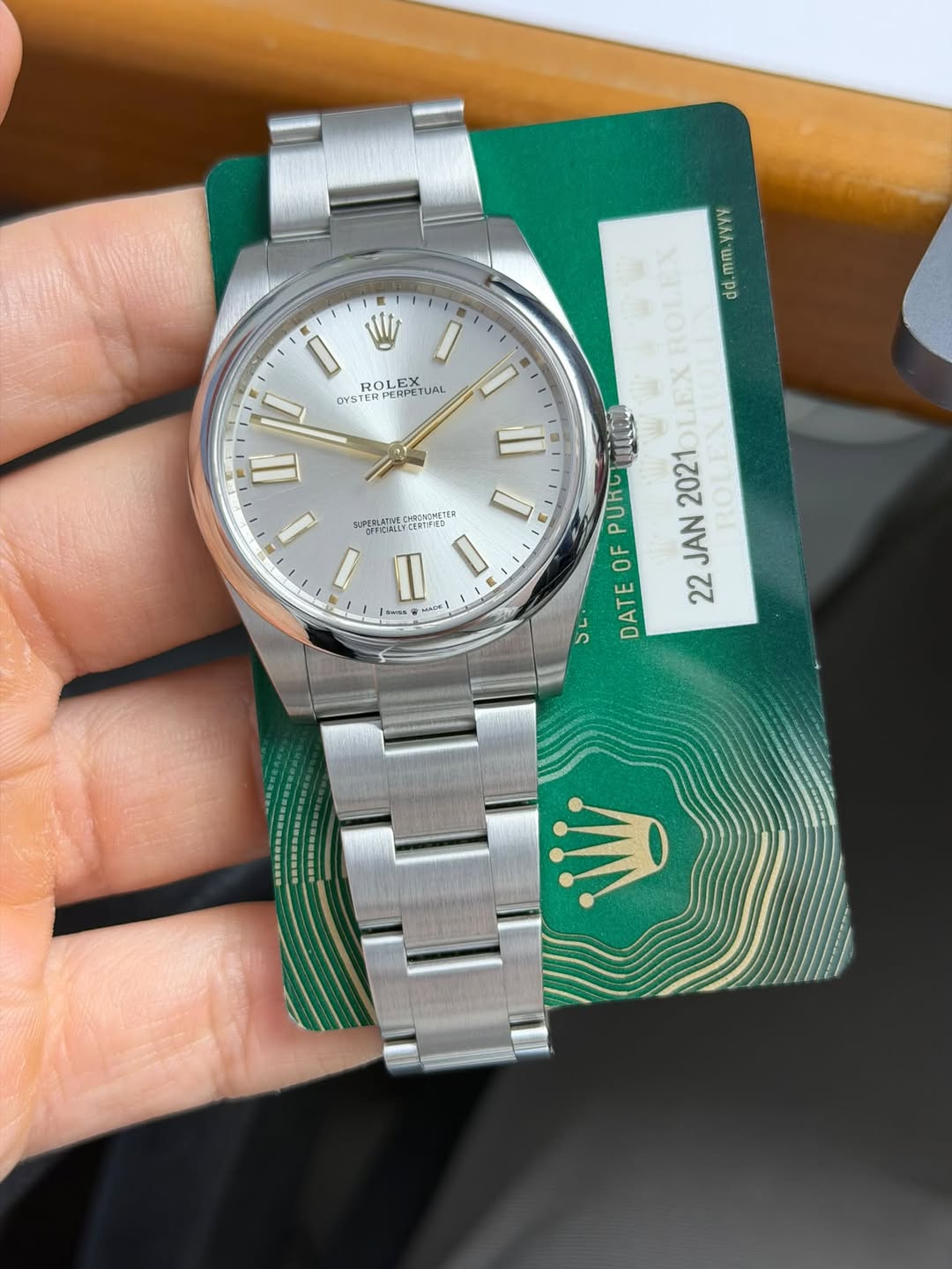 May be an image of wrist watch and text