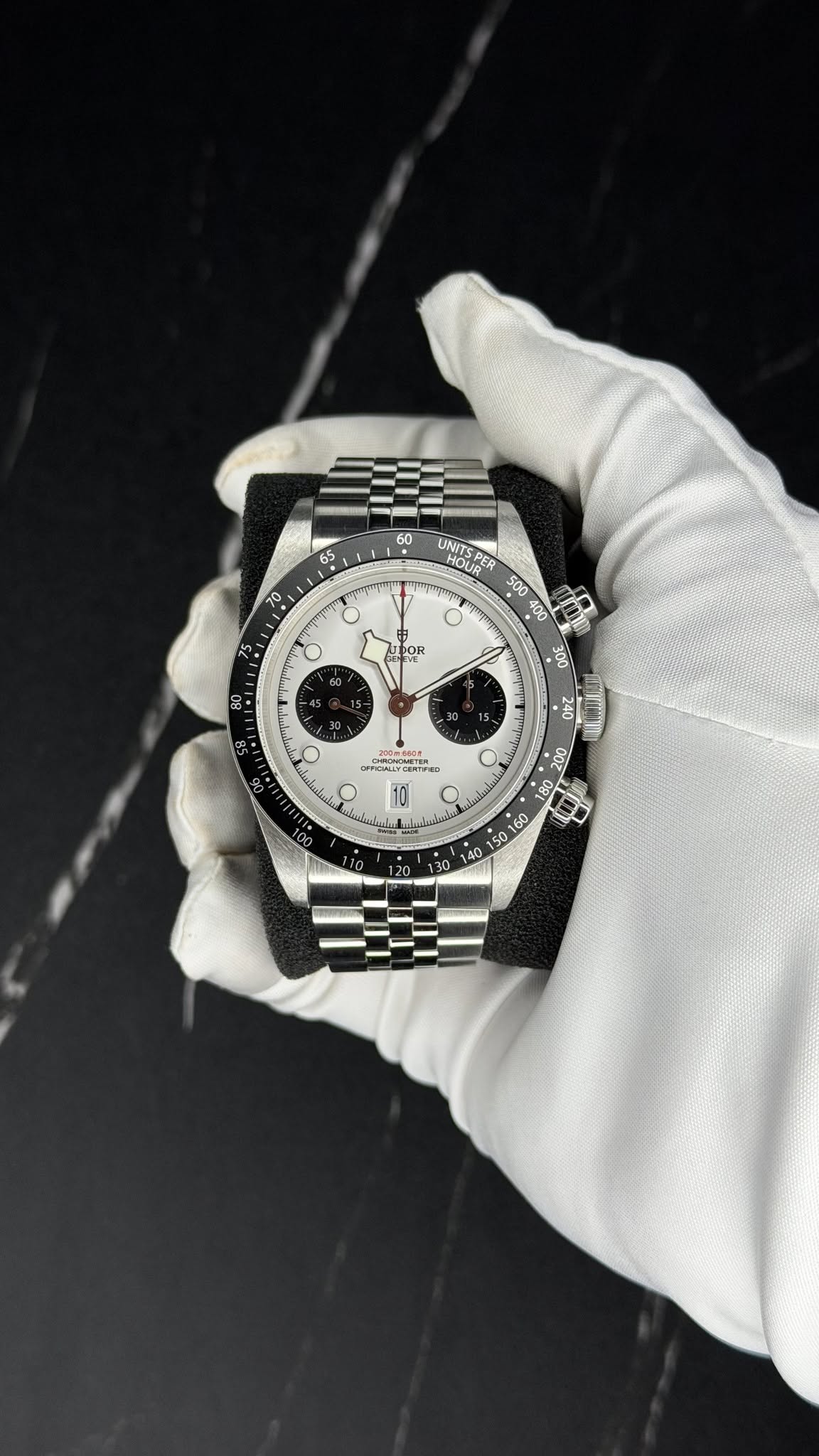 May be an image of wrist watch and text