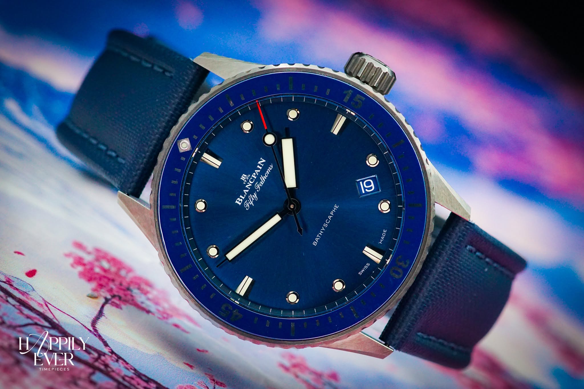 May be an image of wrist watch and text that says '-- BLAŃCPAIN BLA Fifly RCPAIN Futhoms 19 MADE BATHYSCAPHE SWYISS H H/PPILY PPILY EVER ME- TIMEPIECES ECEM'