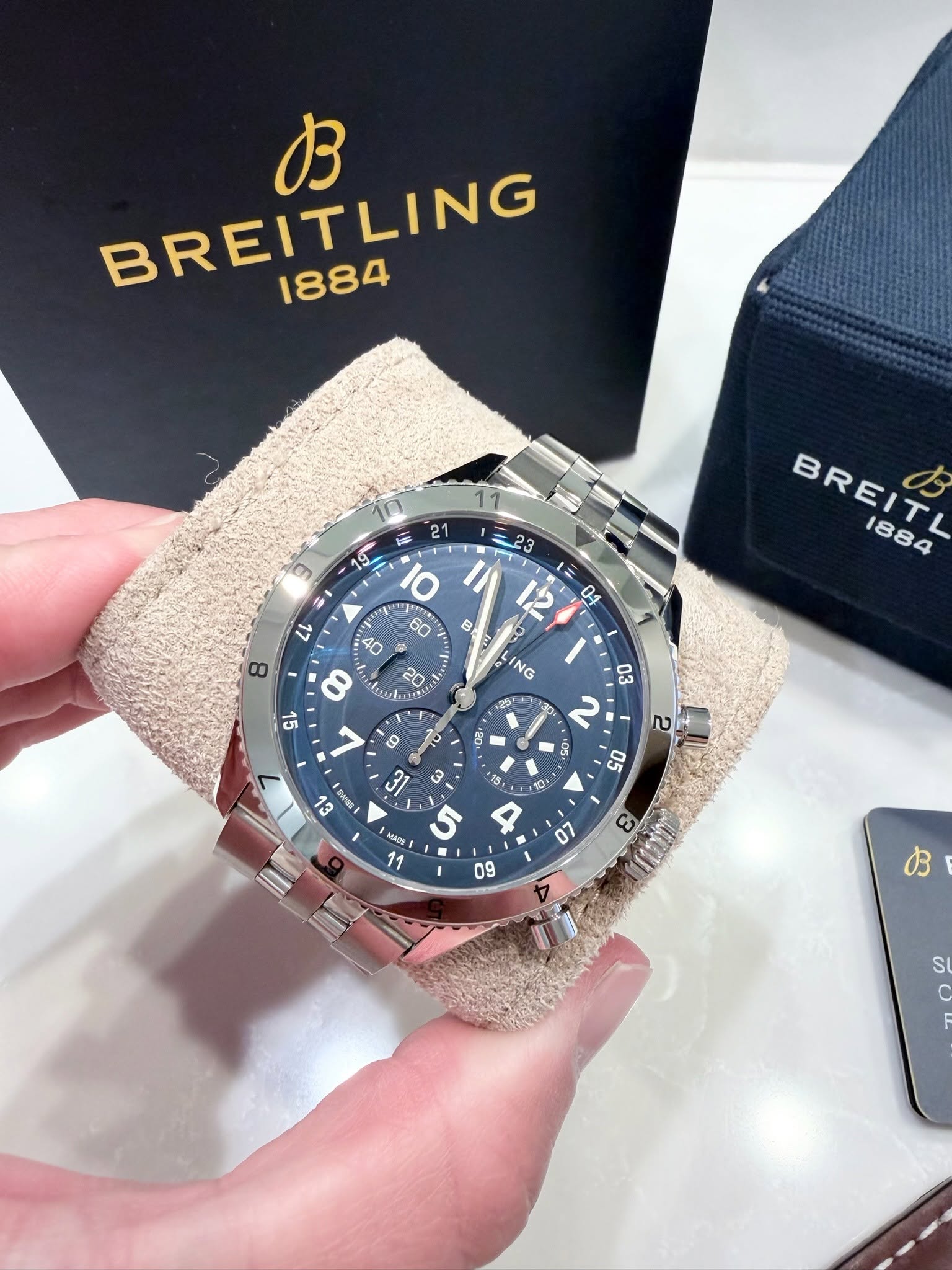 May be an image of wrist watch and text