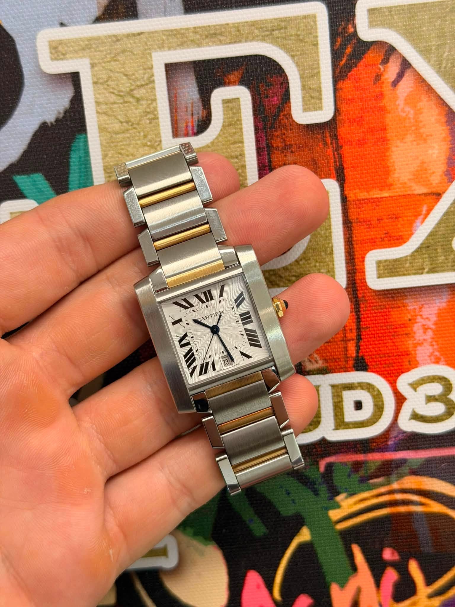 May be an image of digital watch and text that says 'ARTIER D3 ለሽህ'