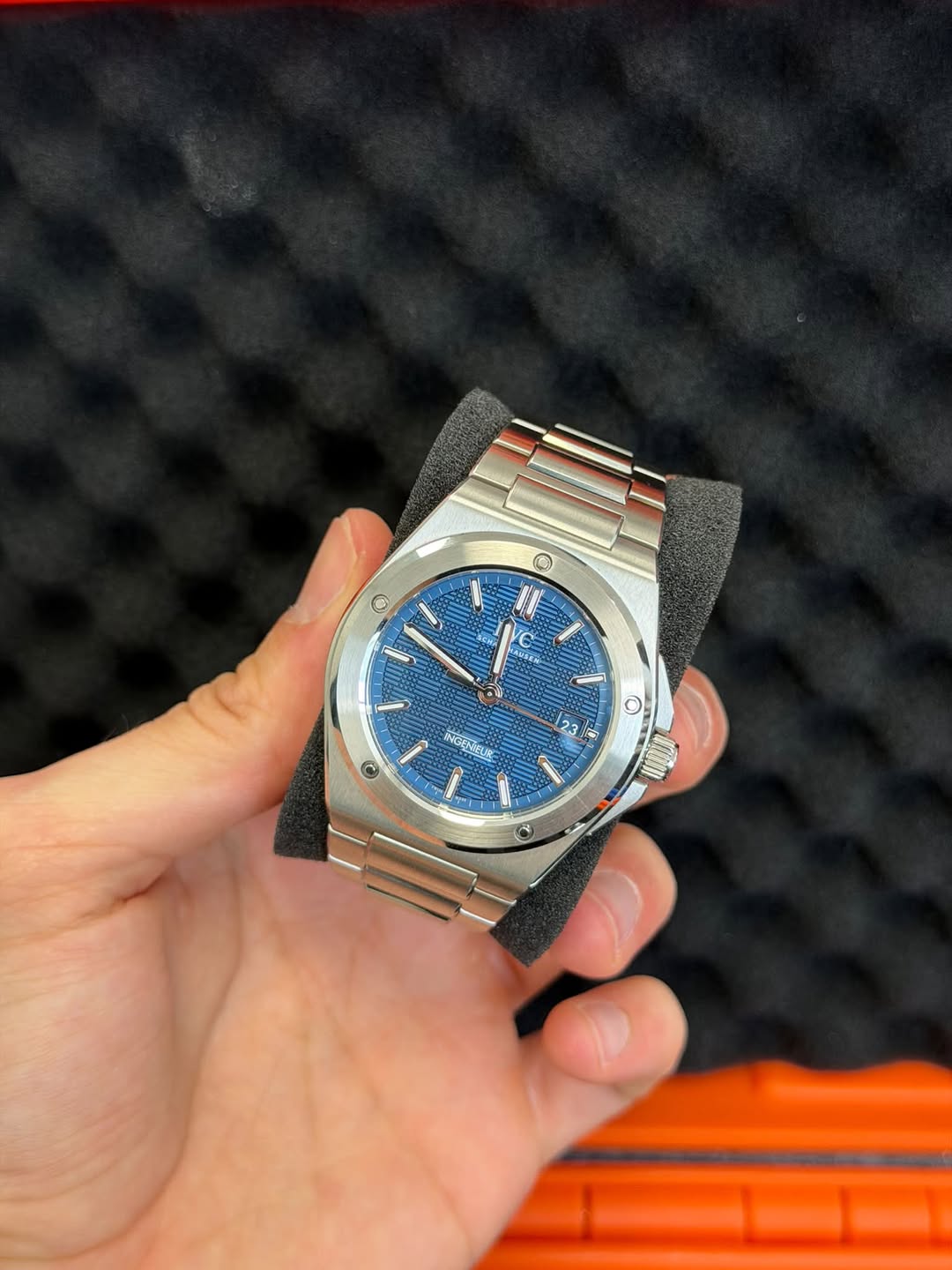 May be an image of wrist watch and text