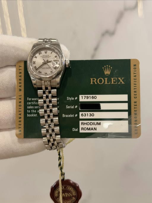 May be an image of wrist watch and text that says '一 AM ROLEX he 태 K WARRANTY Forwarr war For certitic salessen sen sales to tothe to bookle let. Style# # Serial # Bracelet # W…