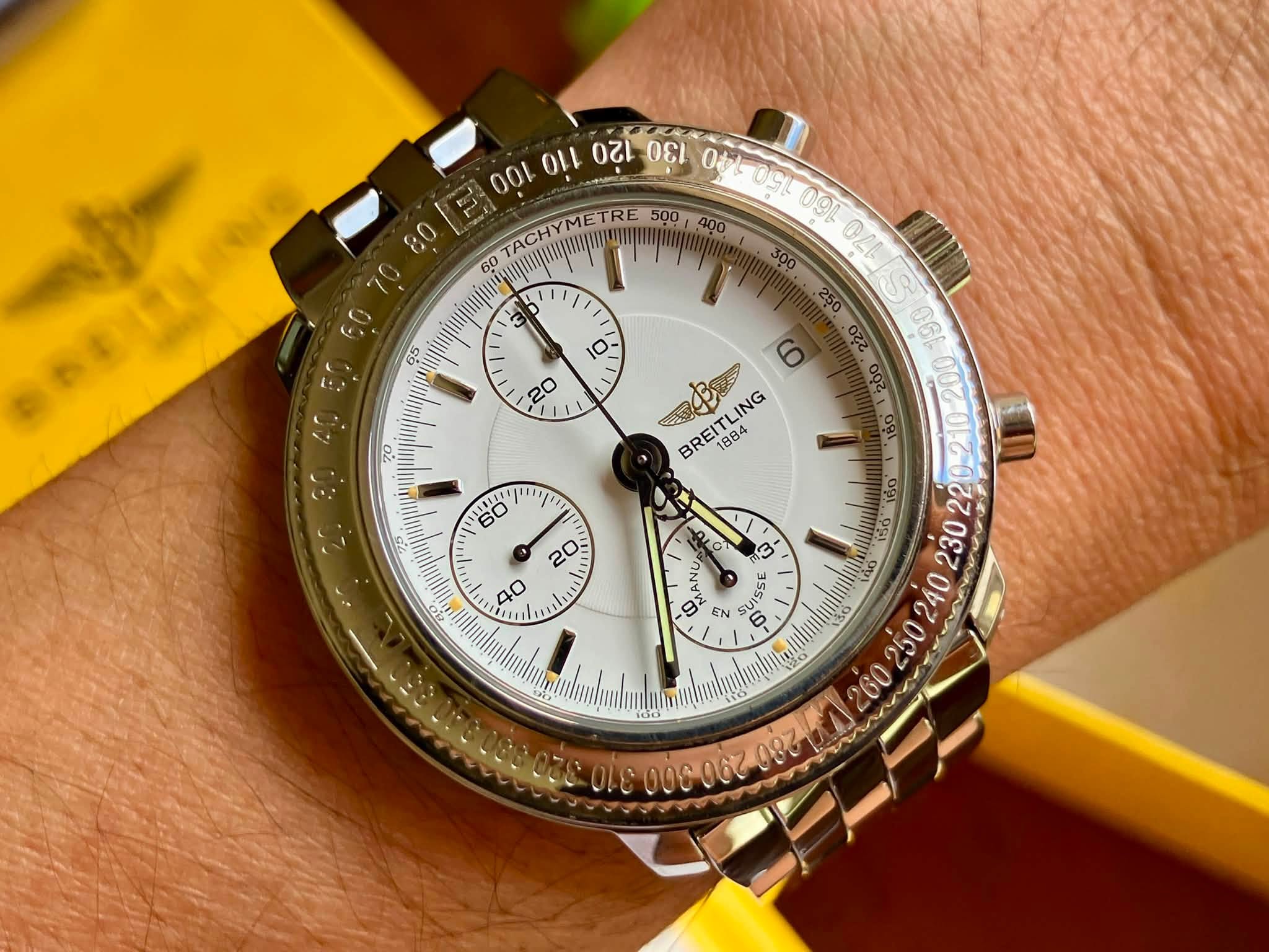 May be an image of wrist watch and text that says '80 /יל 65 D 20 100 ομ か TACHYMETRE OOL 60 300 O2I S C6e 180 မိဝ আইરজ BREITLING BREIGA ING 1884 יין 60 ល 40 3 จ = 6 MANI EN ራስ…