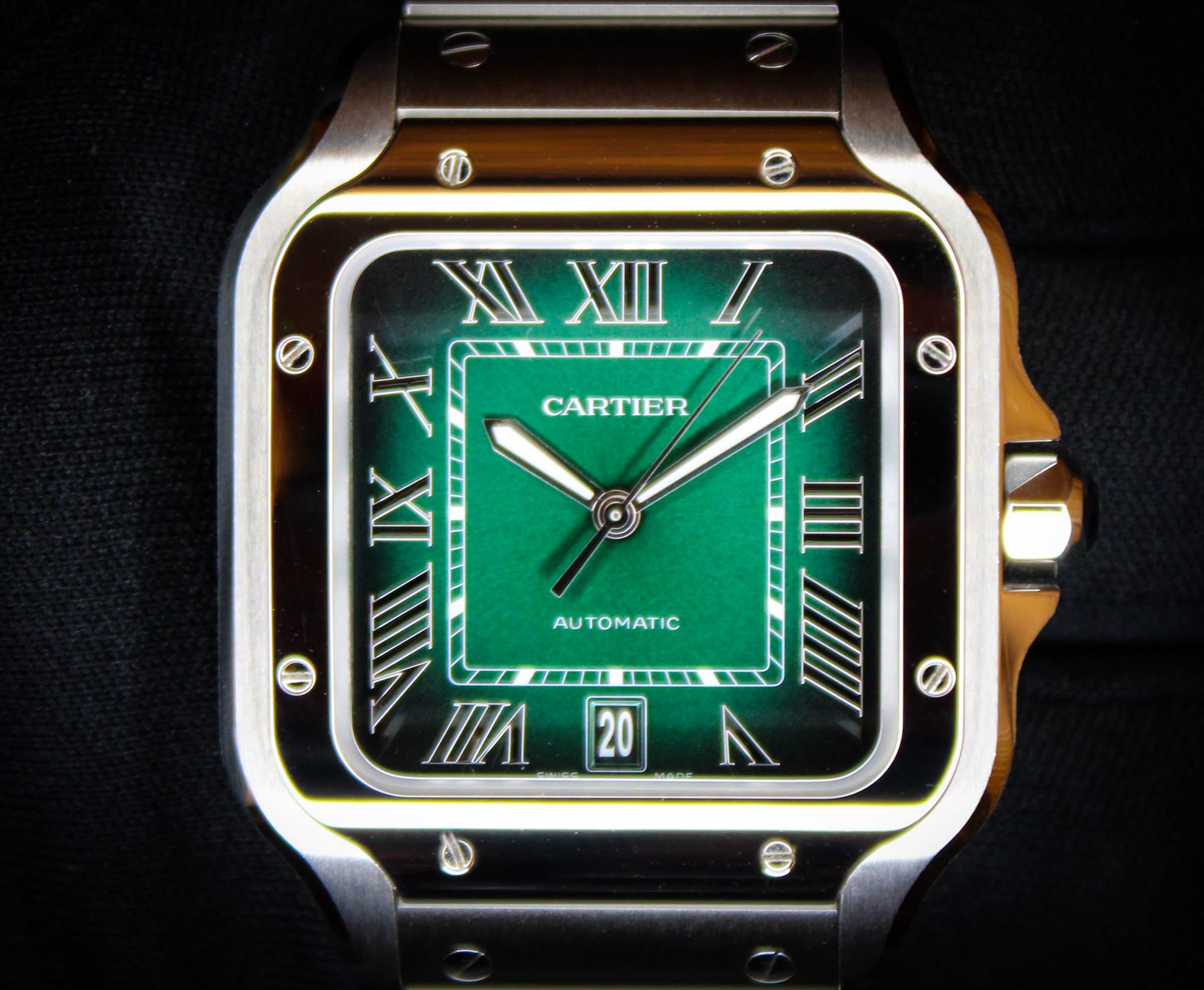 May be an image of digital watch and text that says 'CARTIER XIXIIII I XI XIII 一 部 IX O VITT II1 IIII IIIIII ٨ 20'