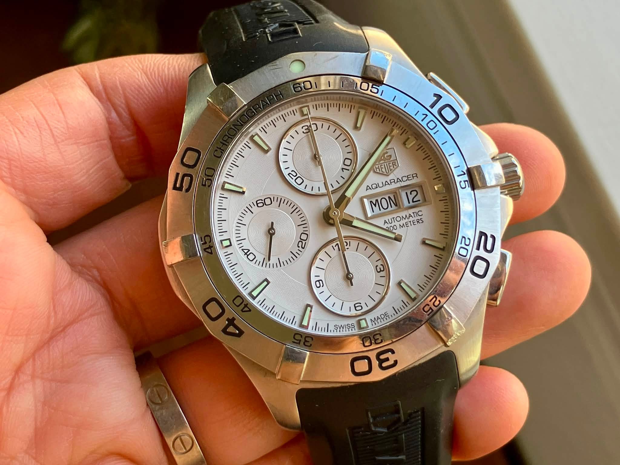 May be an image of wrist watch and text that says '0 051 መማጣ U 10 10 เทรุมปรูนรย מיייייויייןו 0 ம 7 20 三 יויייויוייין 40 ای 0 HETER AQUARACER MON 12 AUTOMATIC METERS 200 02 민 /י…