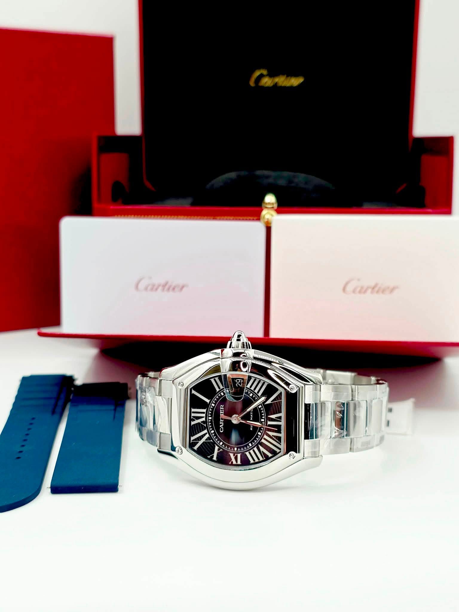 May be an image of wrist watch and text that says 'Cartier Carlier و I ማ V XII ነ SE OHY CAR 0 N XI R'