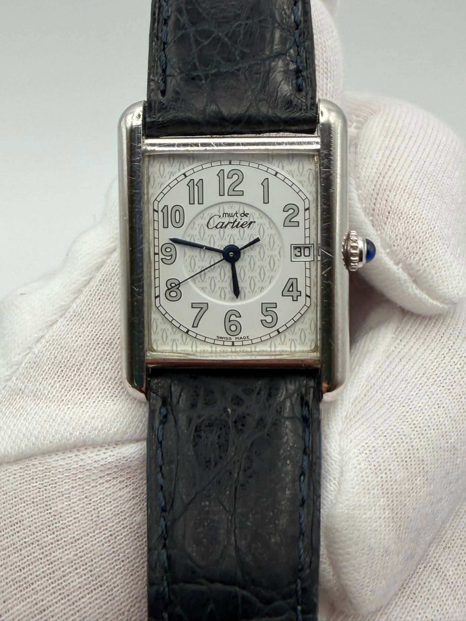 May be an image of wrist watch and text that says ' mut de de Cartier ق 2 9 8 제 765 00 SSMADE MADE 7 6 5 30 ញា1ា'