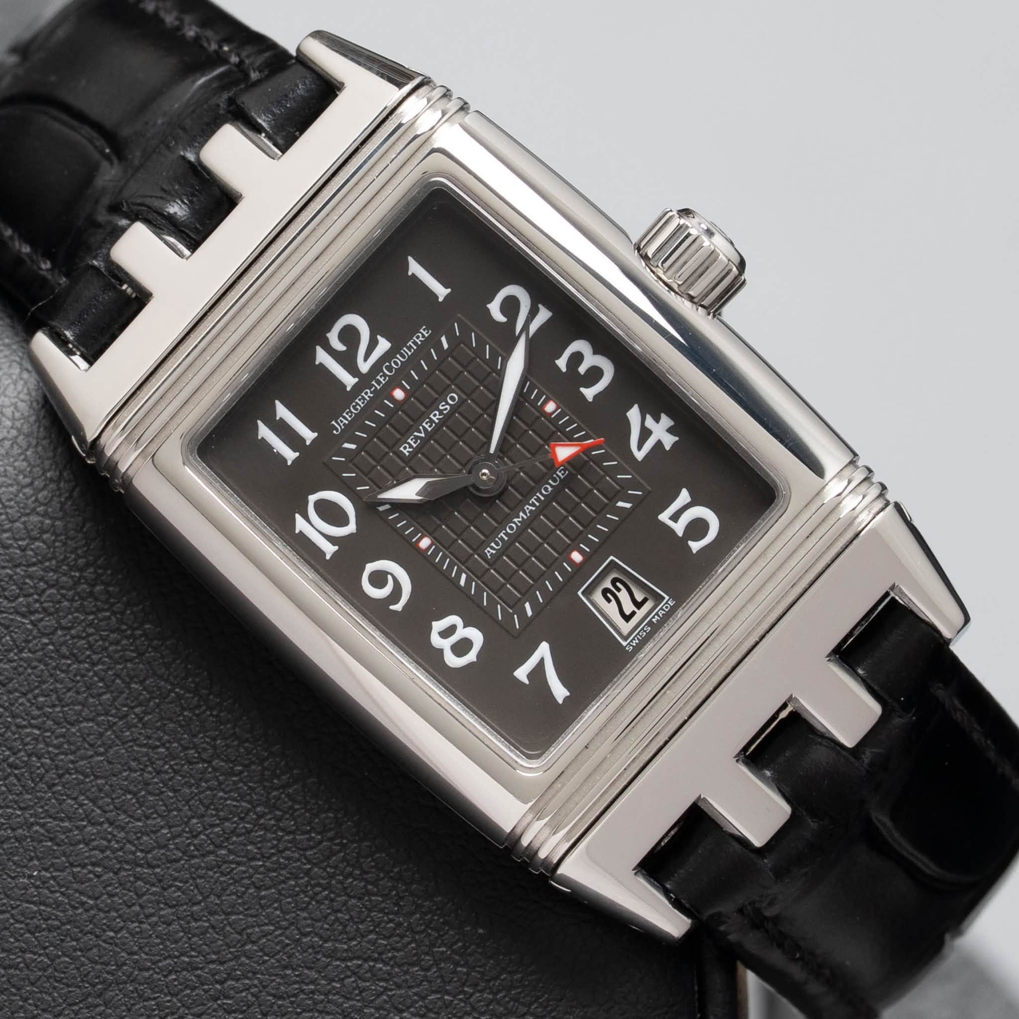 May be an image of digital watch and text that says '1 12 JAEGER-LECOULTRE ๓ am+ ال ന ด 11 JAE REVE REVERSO so + ర UTOMATI RL ل و ህገ 22 WISSMADE MADE ADE 8 1'