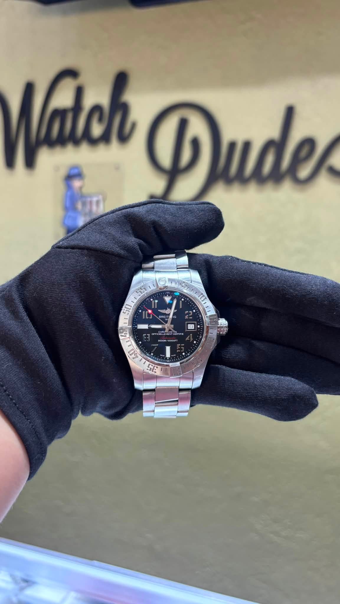 May be an image of wrist watch and text
