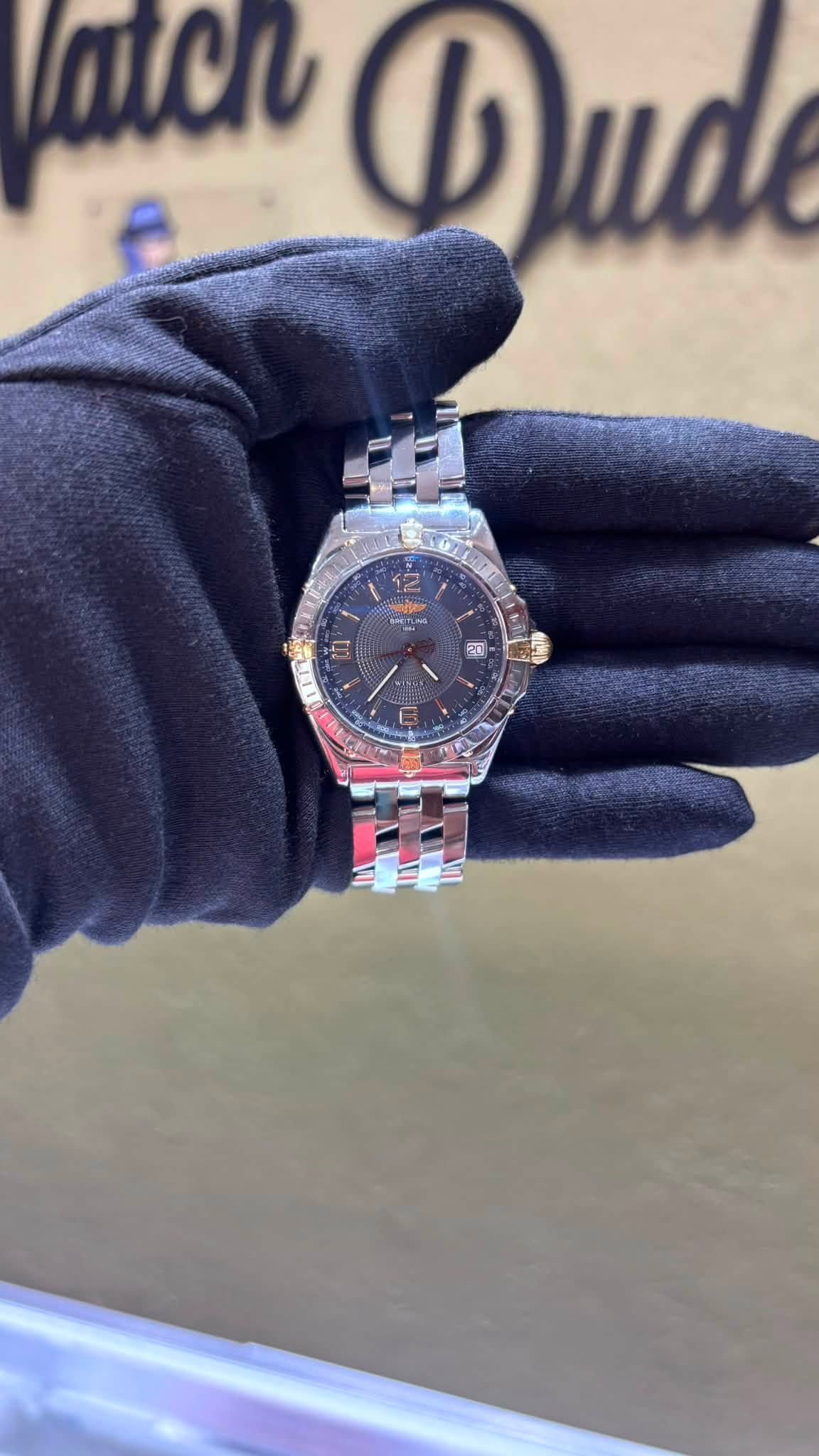 May be an image of wrist watch and text