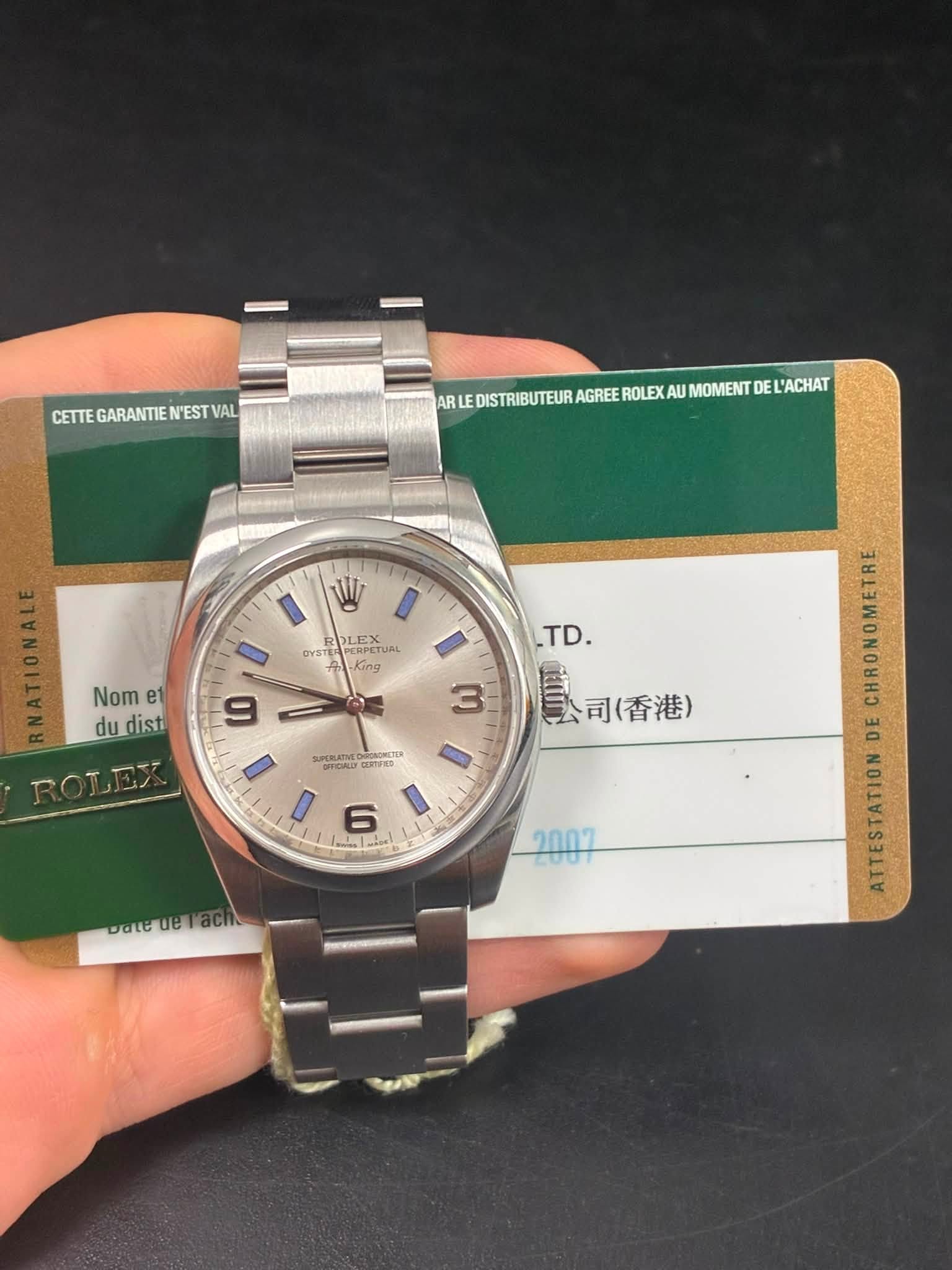May be an image of wrist watch and text that says 'CETTEGARANTIENESTVAL CETTE GARANTIE N'EST VAL ARLE ARIEDSRTERAGREAMA DISTRIBUTEUR AGREE ROLEX AU MOMENT DE DEL'ACHAT W LEX OYST…