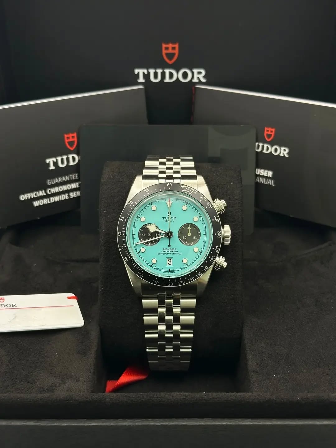 May be an image of wrist watch and text that says 'TUDOR TUD GUARANTE EE OFFICIAL WORLDWIDE CHRONOME SER UDOR 65 70 USER ANUAL UNTSPER HOUR 500 F3 TUTON O O የፕንን 15 R รัย ه f :…