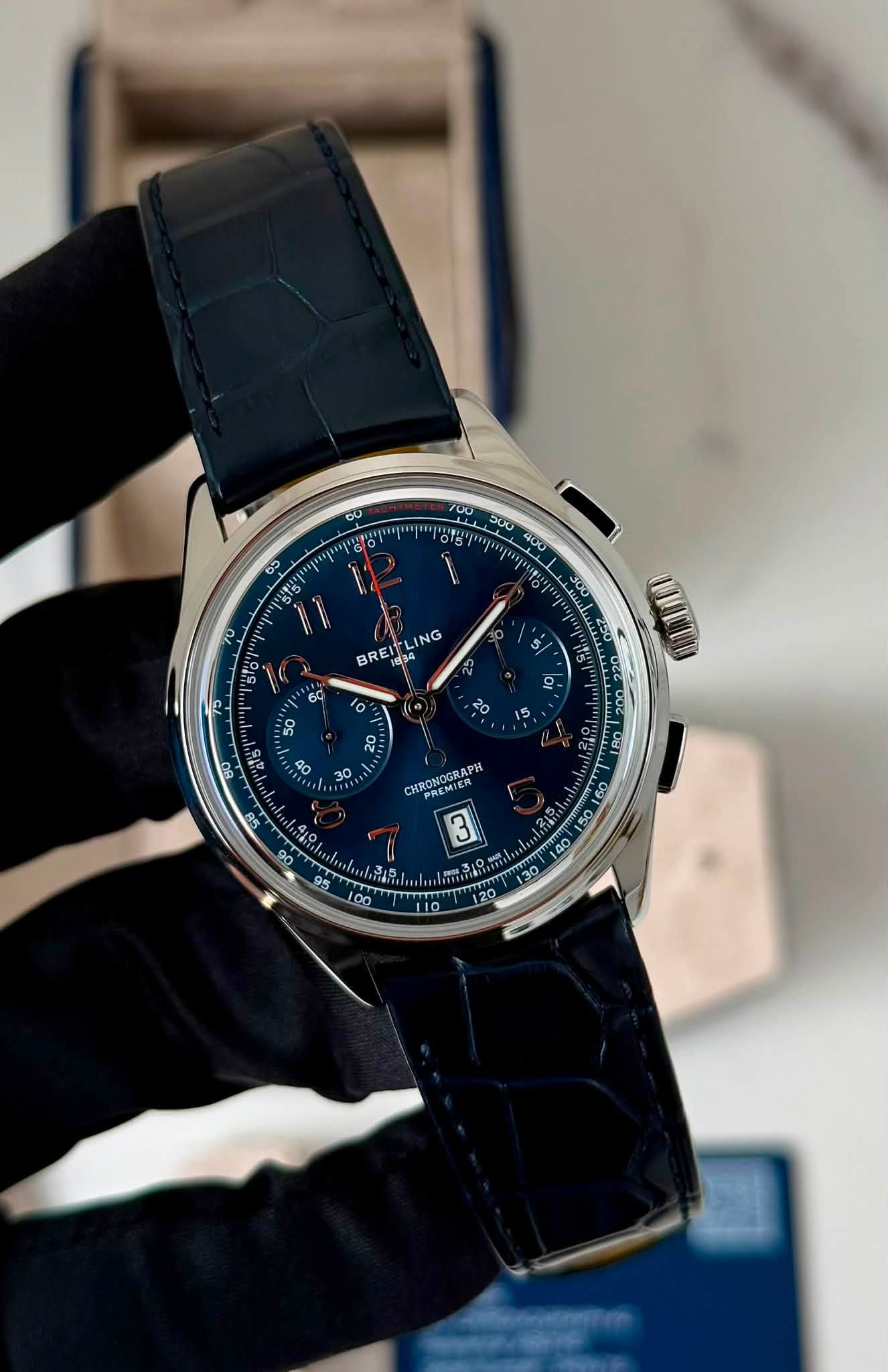 May be an image of wrist watch and text that says 'ပ “ሪይን မဒ 00 วปช BREIT REITLING ING 34 60 כן O 50 UT 20 O 30 CHRONOGRAPH BONOCRAPH APH HADTMIER 3 S slgl 11O'