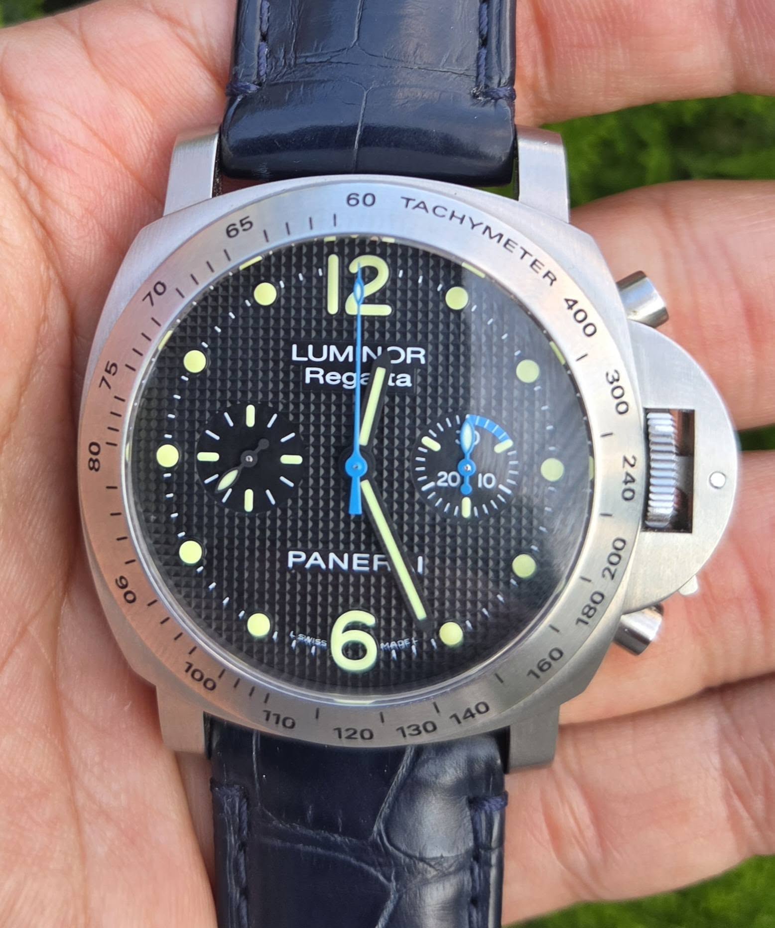 May be an image of wrist watch and text that says ' TACHYMETER TACHNAMETID 400 LUM LUMNOR יא OR Regalia Rega ca 80 300 a 20 I0 240 06 PANER E O MAAc ๓ 140'