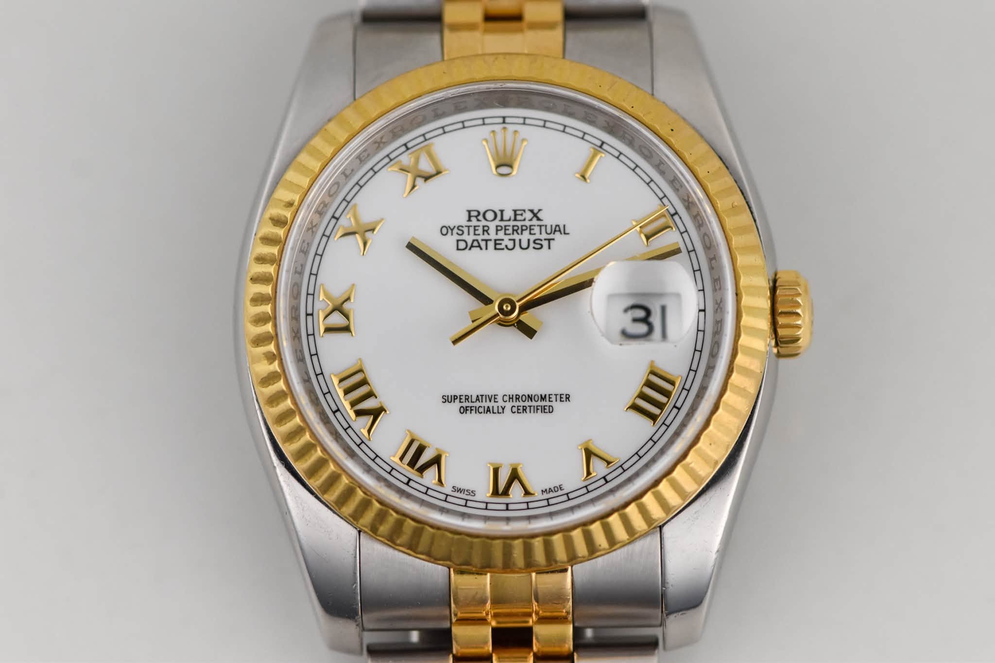 May be an image of wrist watch and text that says 'I XI W 十 ROLEX OYSTER PERPETUAL DATEJUST IX 31 VIII SUPERLATIVECHRONOMETER SUPERLATIVE CHRONOMETER OFFICIALLY CERTIFIED 目 ١ 山…