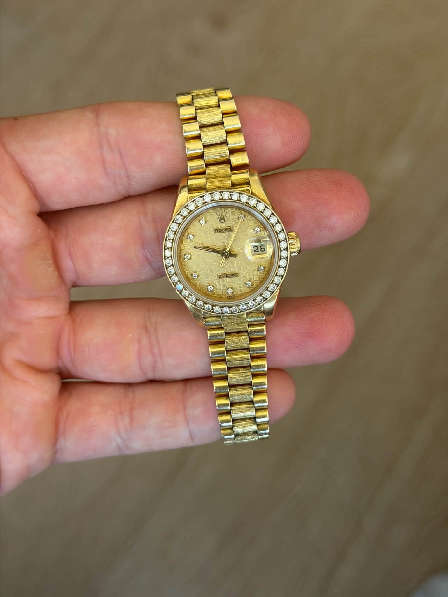May be an image of wrist watch