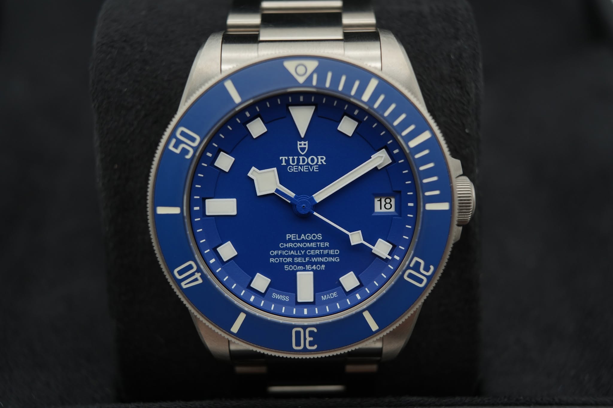 May be an image of wrist watch and text that says '50 円 TUDOR GENEVE 18 PELAGOS CHRONOMET PELAGOS TE ER PECICIALLYC OFFICIALLY CERTIFIED ROTORSEL ROTORSELF-WINDING RSEL F-WINDING…
