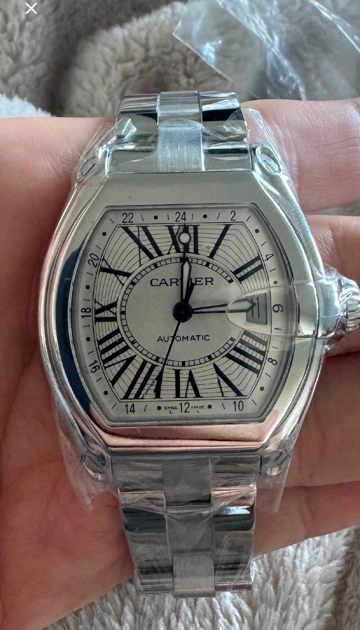 May be an image of digital watch and text