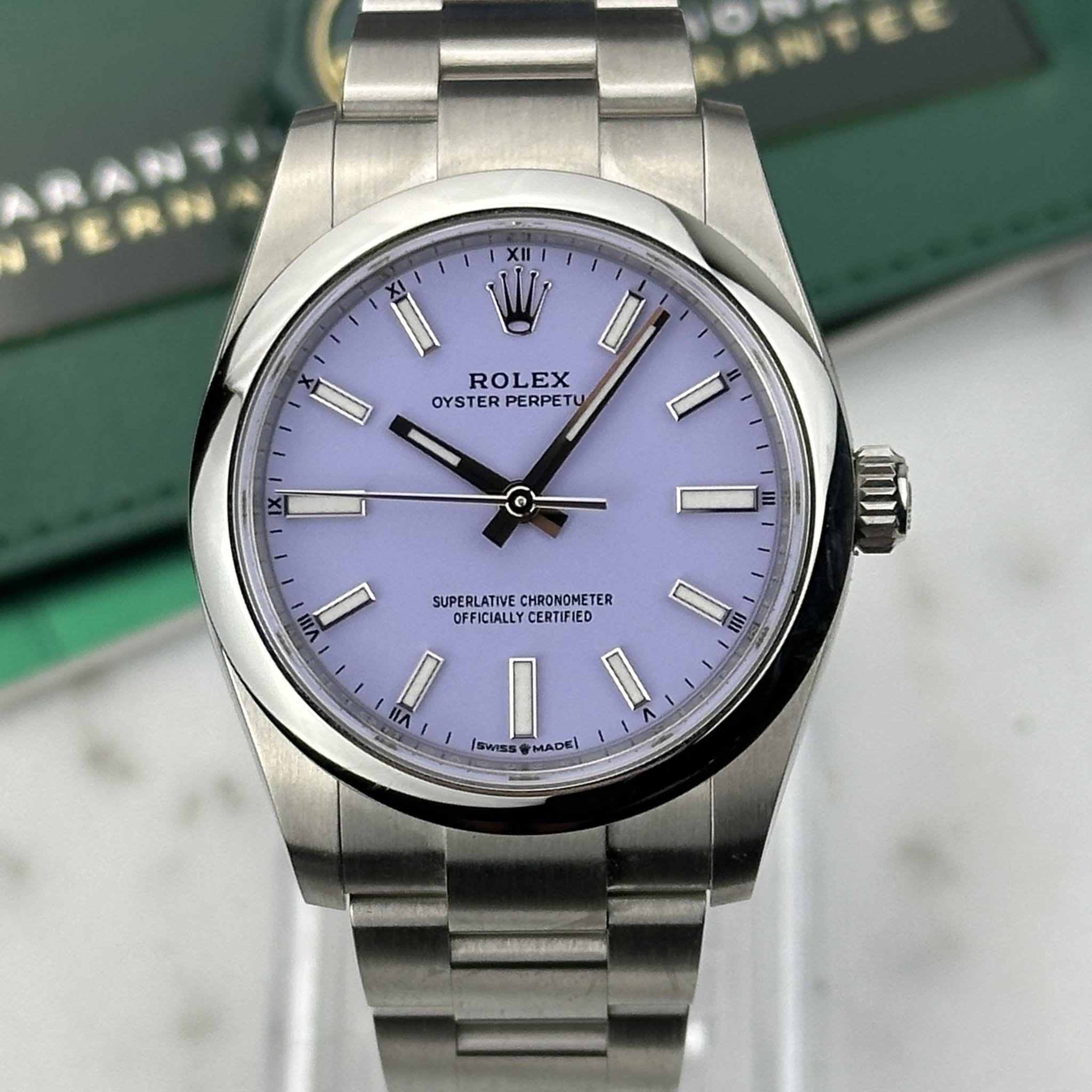 May be an image of wrist watch and text that says 'W ROLEX OYSTER OYSTERPERPETU PERPETU U M mu SUPERLATIVE SUPERLATIVECHRONOMETER SUPERLCTALLONOTER CHRONOMETER TER VmI D OFFICIALLY…