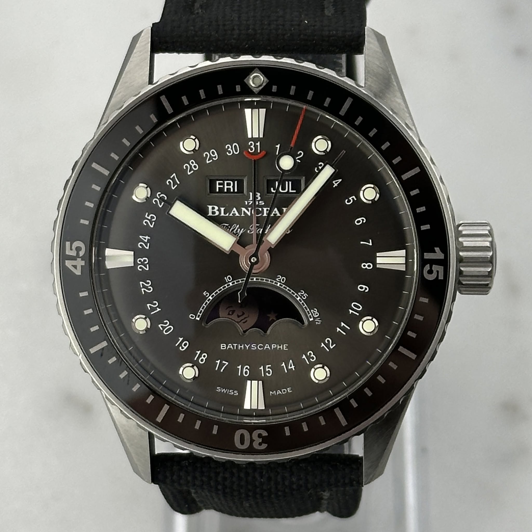 May be an image of wrist watch and text that says '1 2 O 3 FRI JUL 4 I 45 BLANCFA CFA millySal ای O 6 7 ထ و 2 O 02 11 19 BATH BATHYSCAPHE PHE CA SWISS SW MADE'