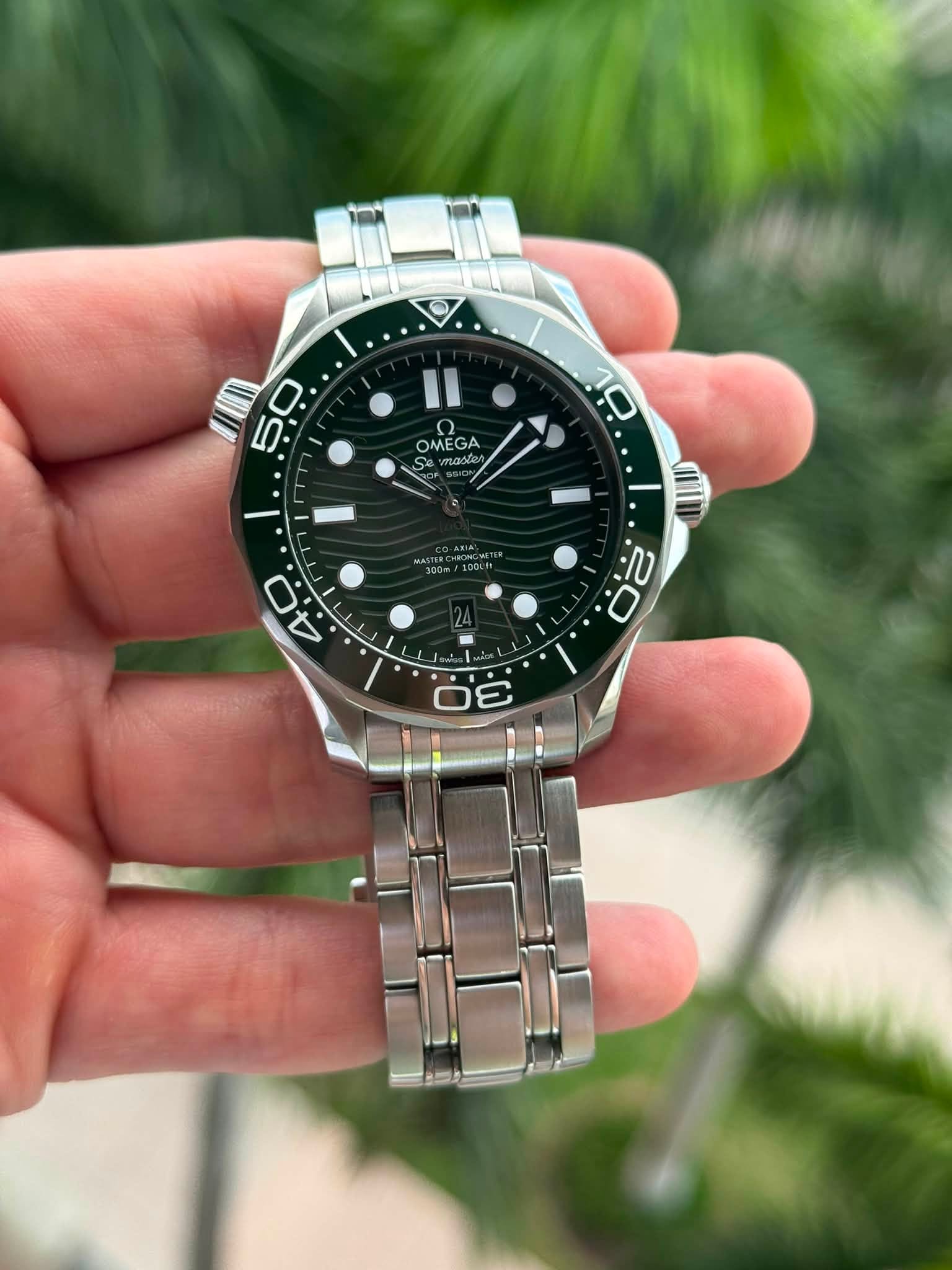 May be an image of wrist watch and text that says '5 50 ቦ 0 OMEGA GA MEG nad ن IIN ar ب 20 ه E 40 4. όέ 2'