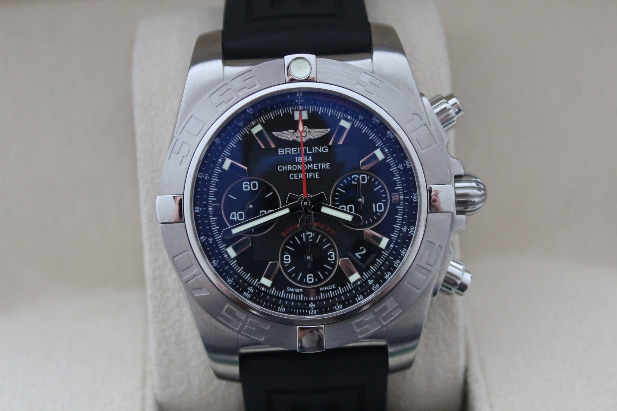 May be an image of wrist watch and text