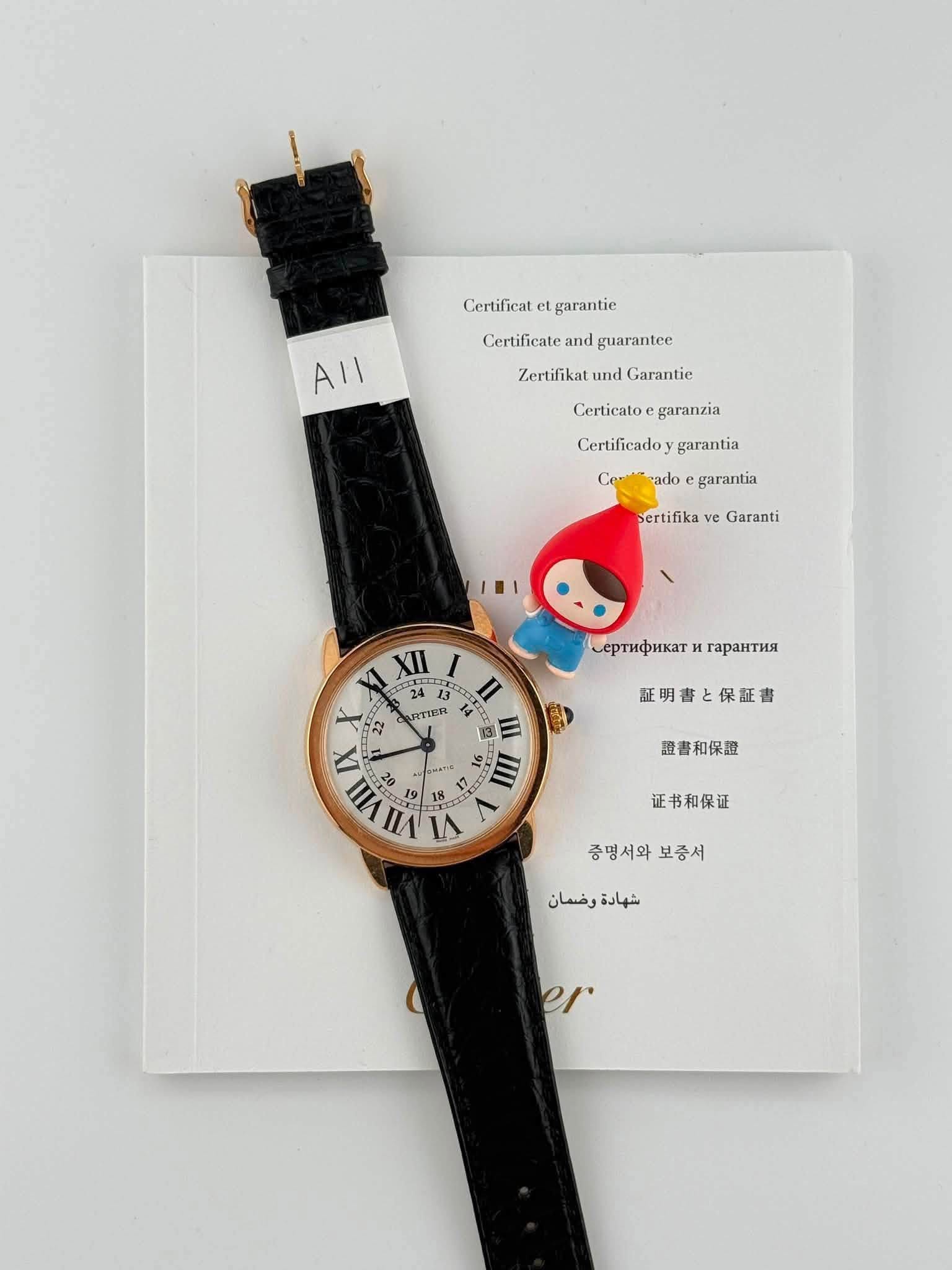 May be an image of leather, wrist watch and text that says 'Certificat garantie Certificate and guarantee All Zertifikat und Garantie Certicatoe garanzia Certificadoy garantia…