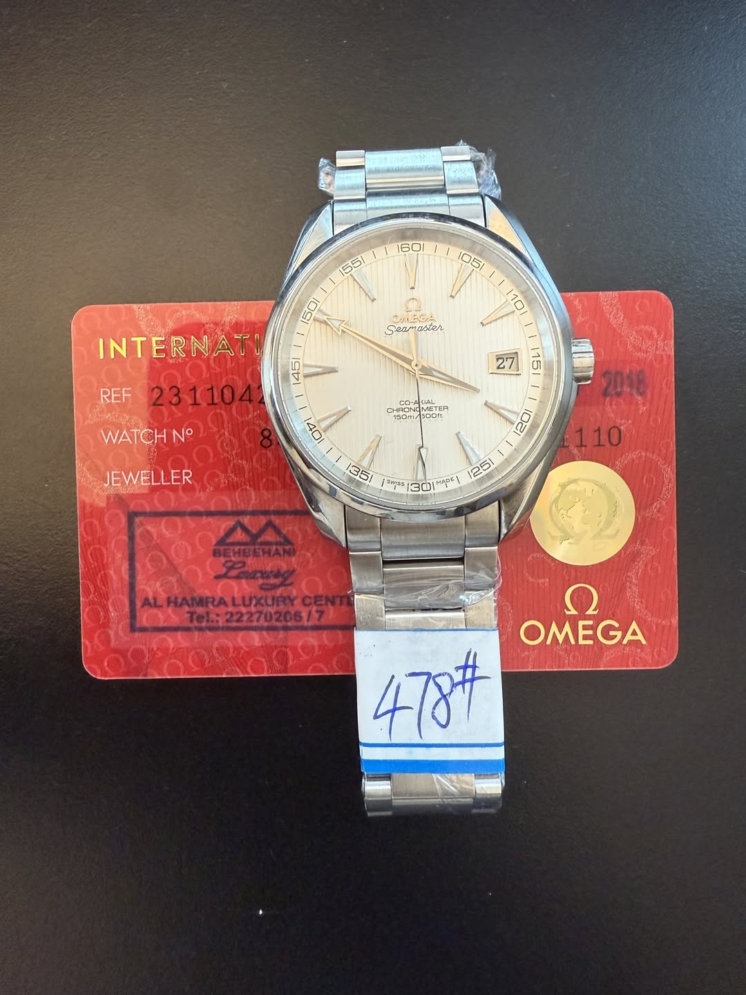 May be an image of wrist watch and text
